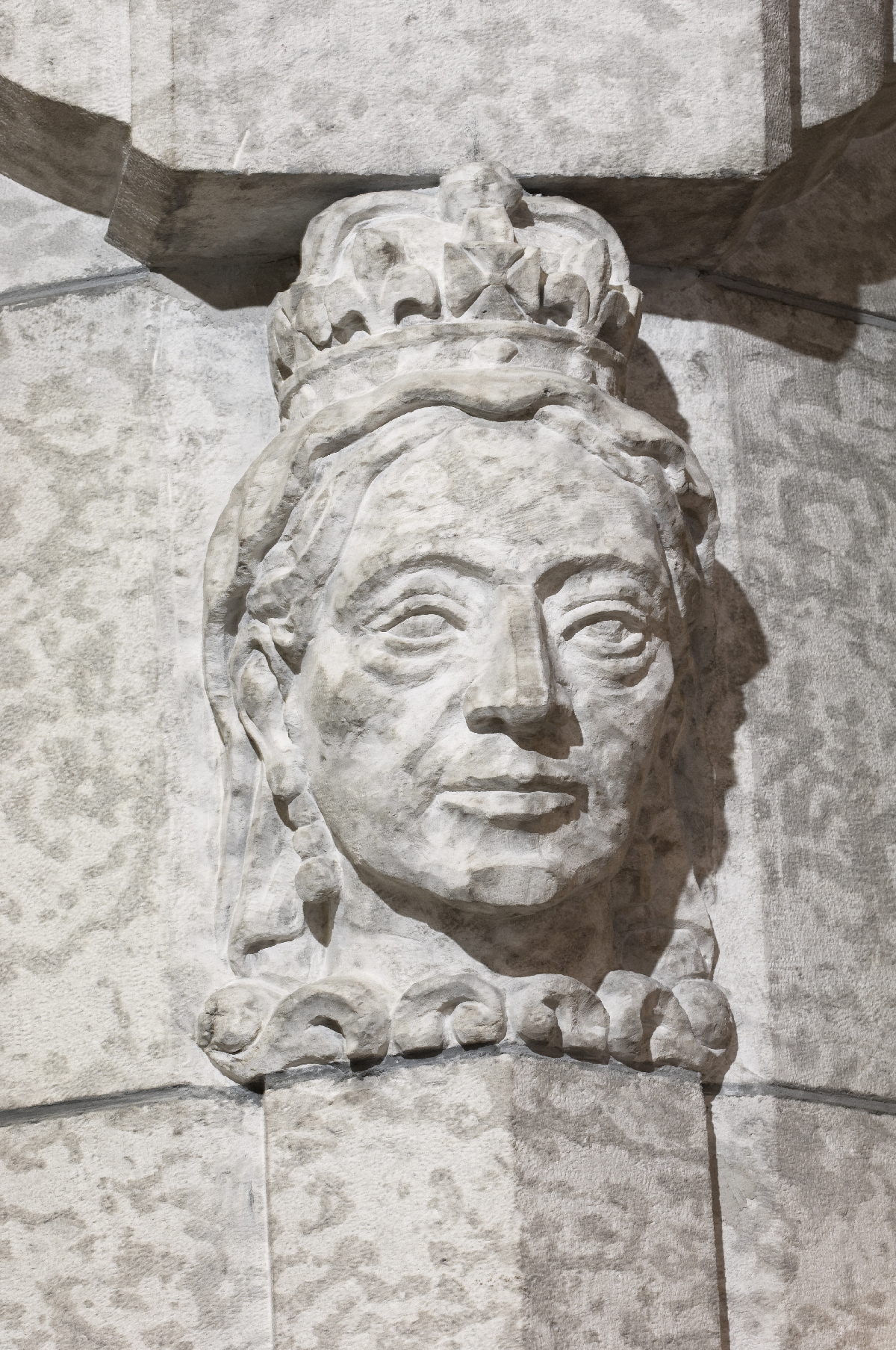This limestone carving of Queen Victoria adorns a ledge on one of the columns flanking the entrance to the Senate antechamber.