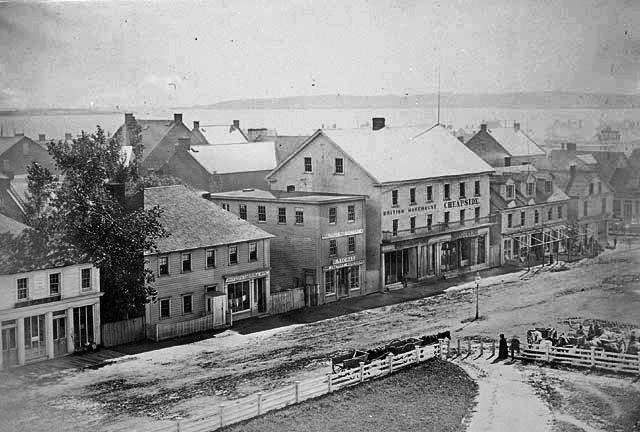 Queen Street, Charlottetown’s main commercial artery in 1867, looking southeast towards the Hillsborough River.