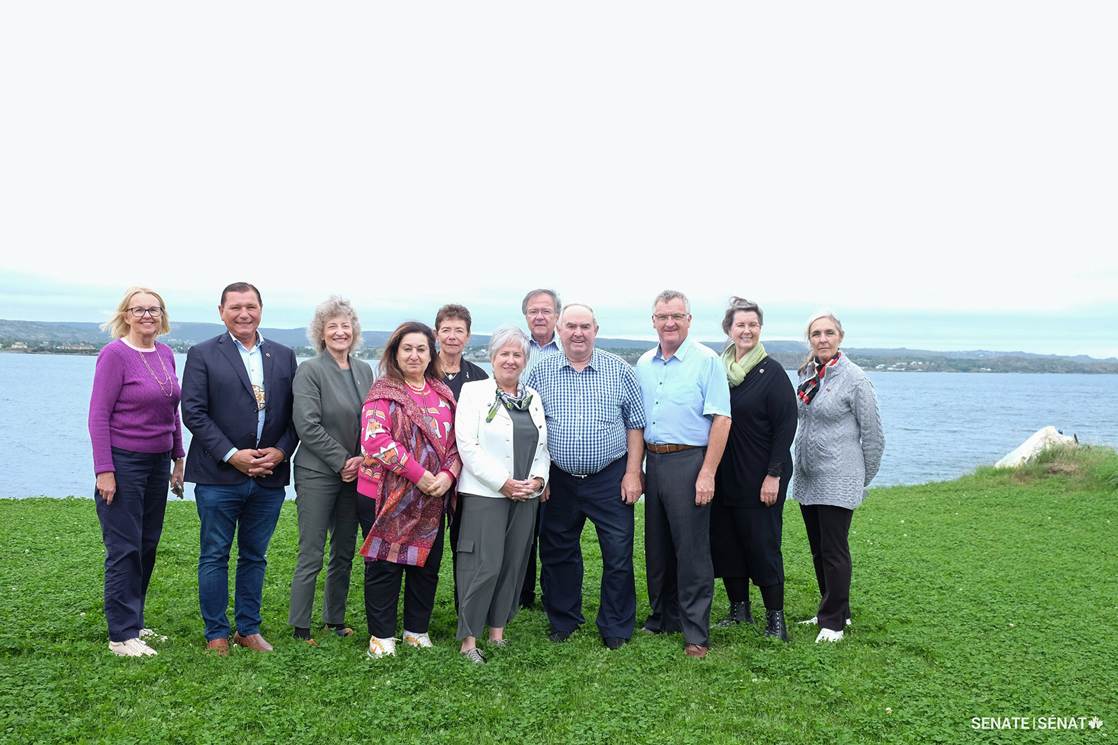 The committee visits Port de Grave to meet with the local harbour authority. From left, senators Jane Cordy, Brian Francis, Pat Duncan, Salma Ataullahjan, Bev Busson, Iris Petten, Jim Quinn, Port de Grave Harbour Authority Treasurer Vernon Petten, and senators Fabian Manning, Marilou McPhedran and Rebecca Patterson.