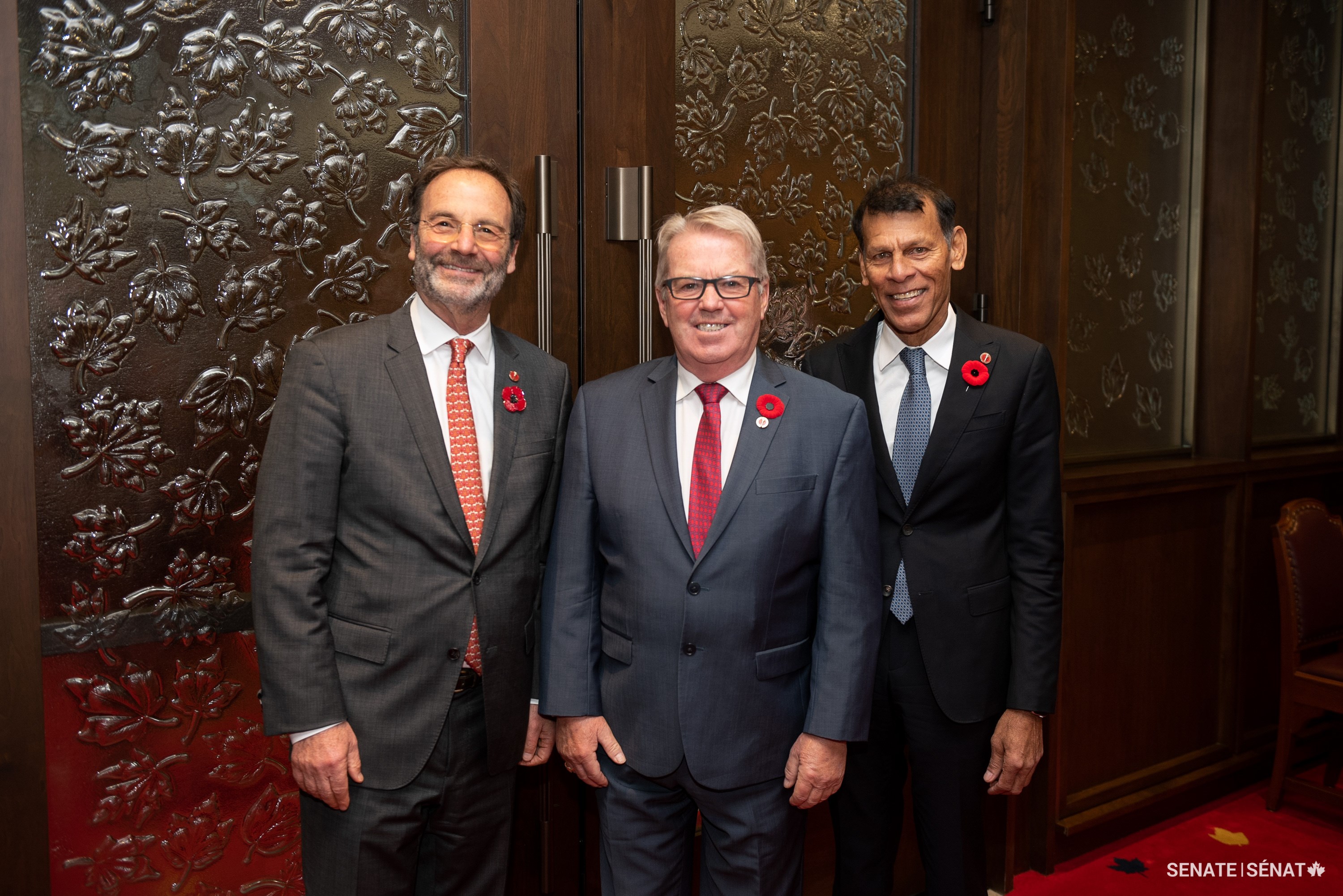 From left, Senator Marc Gold stands with senators Rodger Cuzner and Hassan Yussuff ahead of Senator Cuzner’s swearing-in ceremony on November 7, 2023.