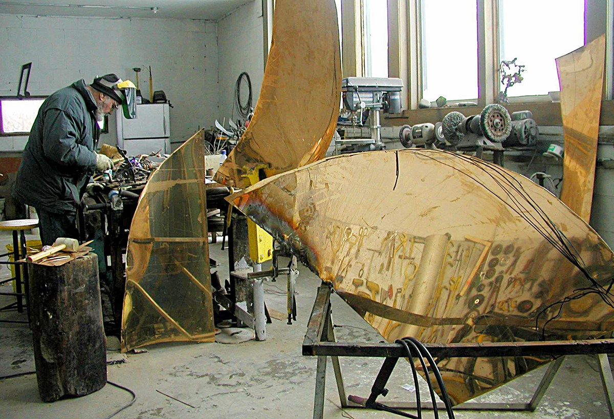 Mr. Garner works on <em>Paso Doble</em> in his studio in Plantagenet, Ontario, in 2008. The five-metre bronze stands near the Canadian Museum of Nature in downtown Ottawa. (Photo credit: Courtesy of Tamaya Garner)