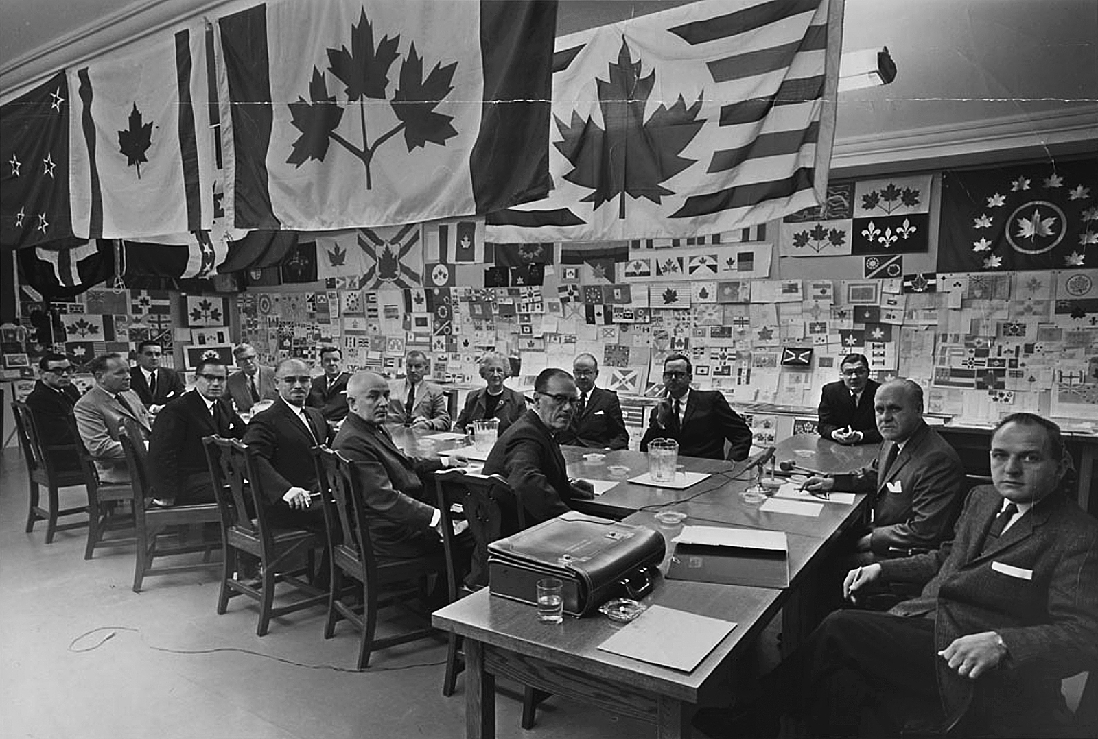 Meeting in 1964, the Standing Committee on the Canadian Flag considered more than 3,500 submissions. (Photo credit: Library and Archives Canada)