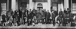 The Fathers of Confederation who attended the 1864 Charlottetown Conference appear in a group photo.