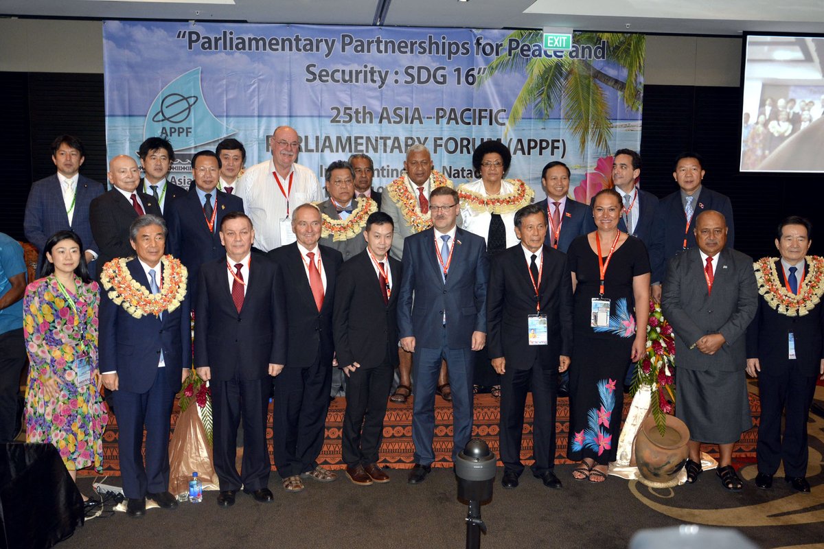 Senator Day (front row, fourth from left) joins the leaders of the other delegations for the official opening of APPF 25.