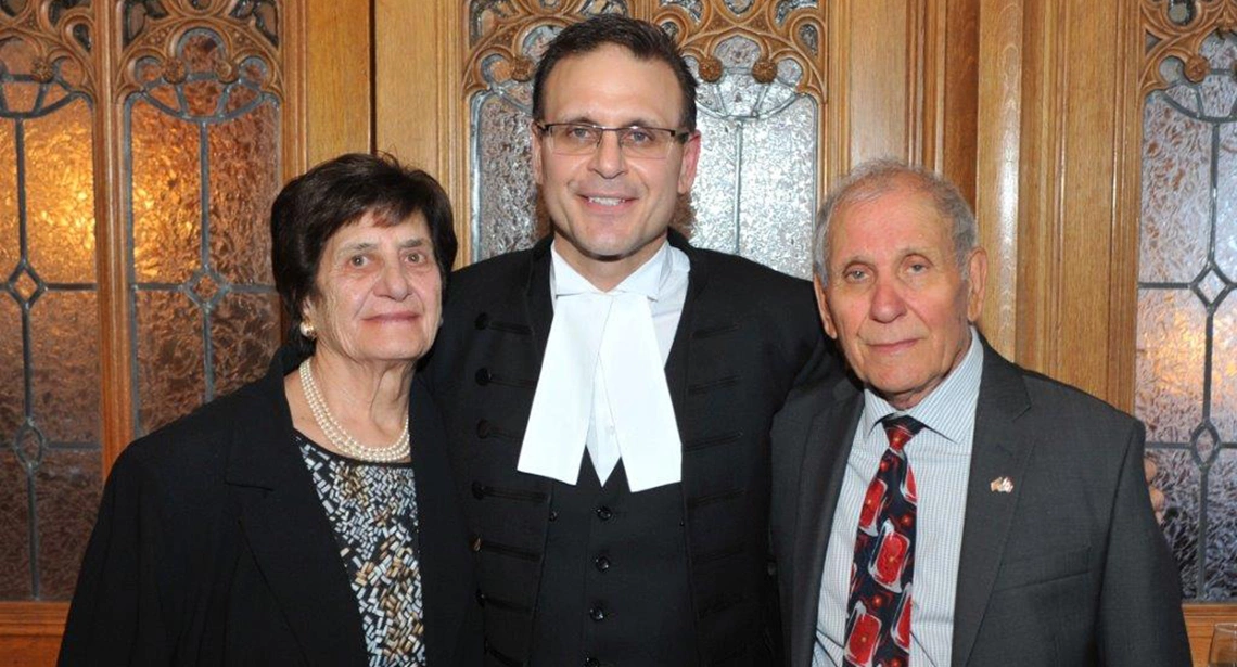 Photo of Senator Housakos with his parents