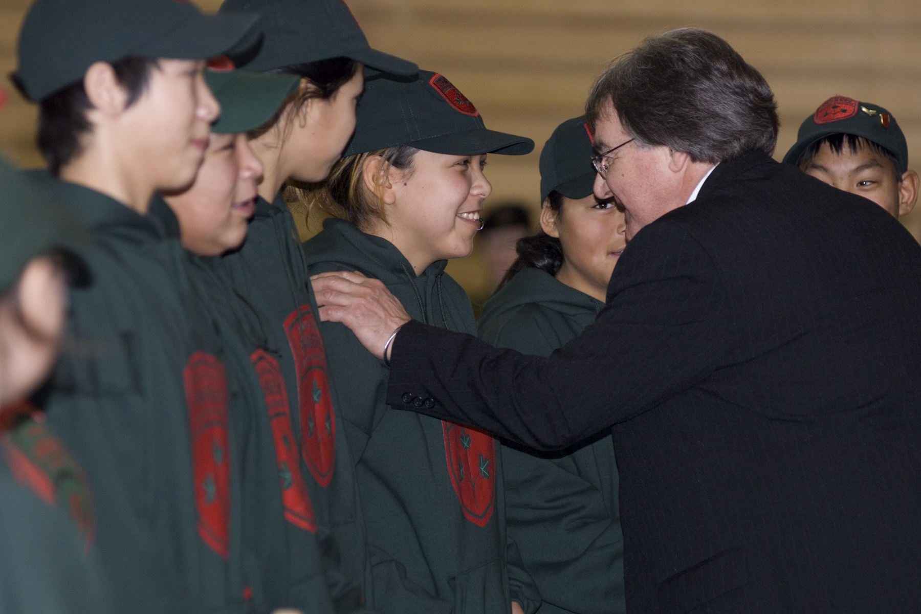 Senator Watt greeting Junior Canadian Rangers on the tenth anniversary of the program, December 2008.