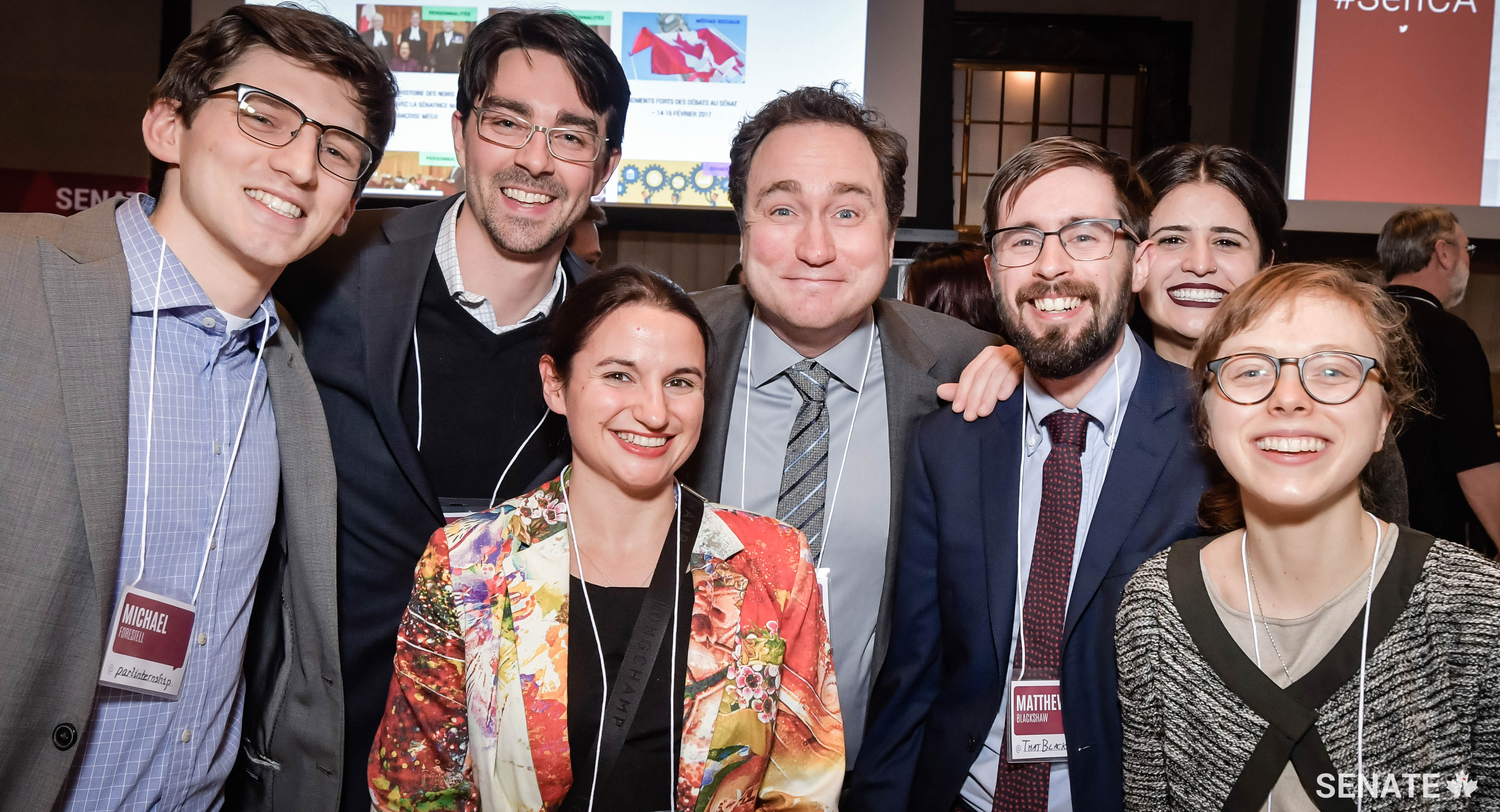 Mark Critch (centre), anchor of CBC’s This Hour Has 22 Minutes, holds court with current and former parliamentary interns Michael Forestell, Josh Regnier, Gabrielle de Billy Brown, Matthew Blackshaw, Christine Guyot, and Claire Sieffert.