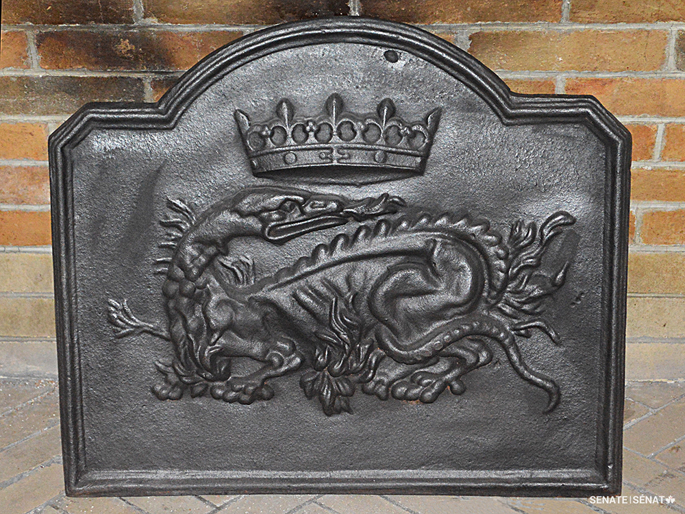 The salamander emblem of François I appears on a fireback from Centre Block’s Salon de la Francophonie. It was designed by Gamble Sheridan Lemasnie and cast by Paul Beau, the team that was responsible for much of Centre Block’s ironwork.