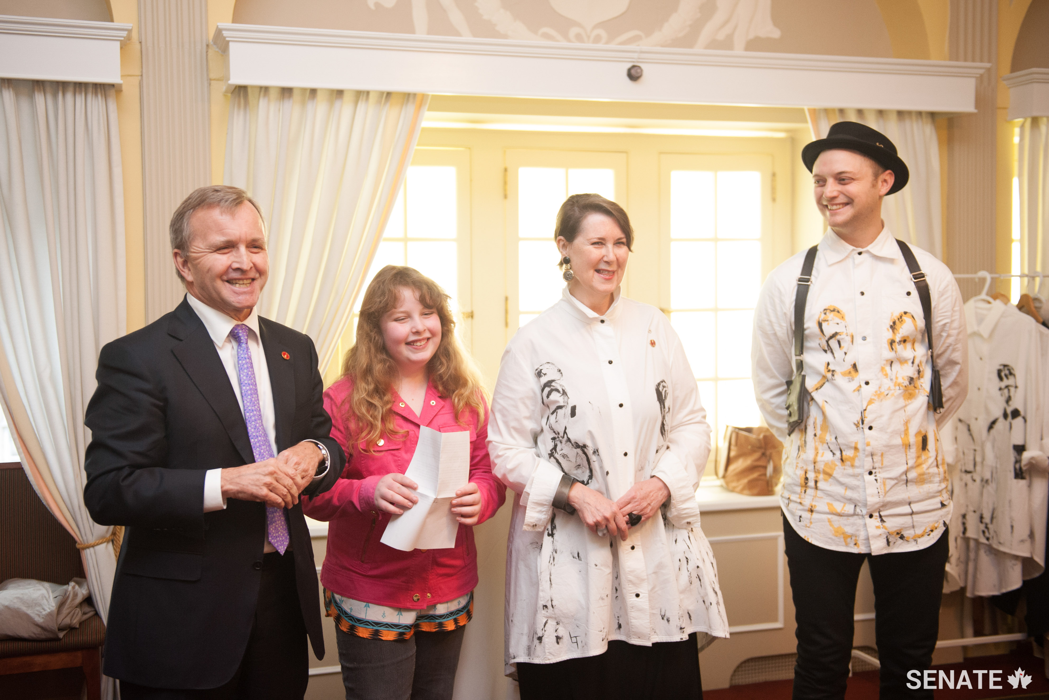 Experience Manitoba Art Live brought together art and political action on Parliament Hill, Apr. 11, 2017. From left to right: Senator Grant Mitchell, transgender rights activist Charlie Lowthian-Rickert, Senator Marilou McPhedran and Winnipeg designer Lennard Taylor.