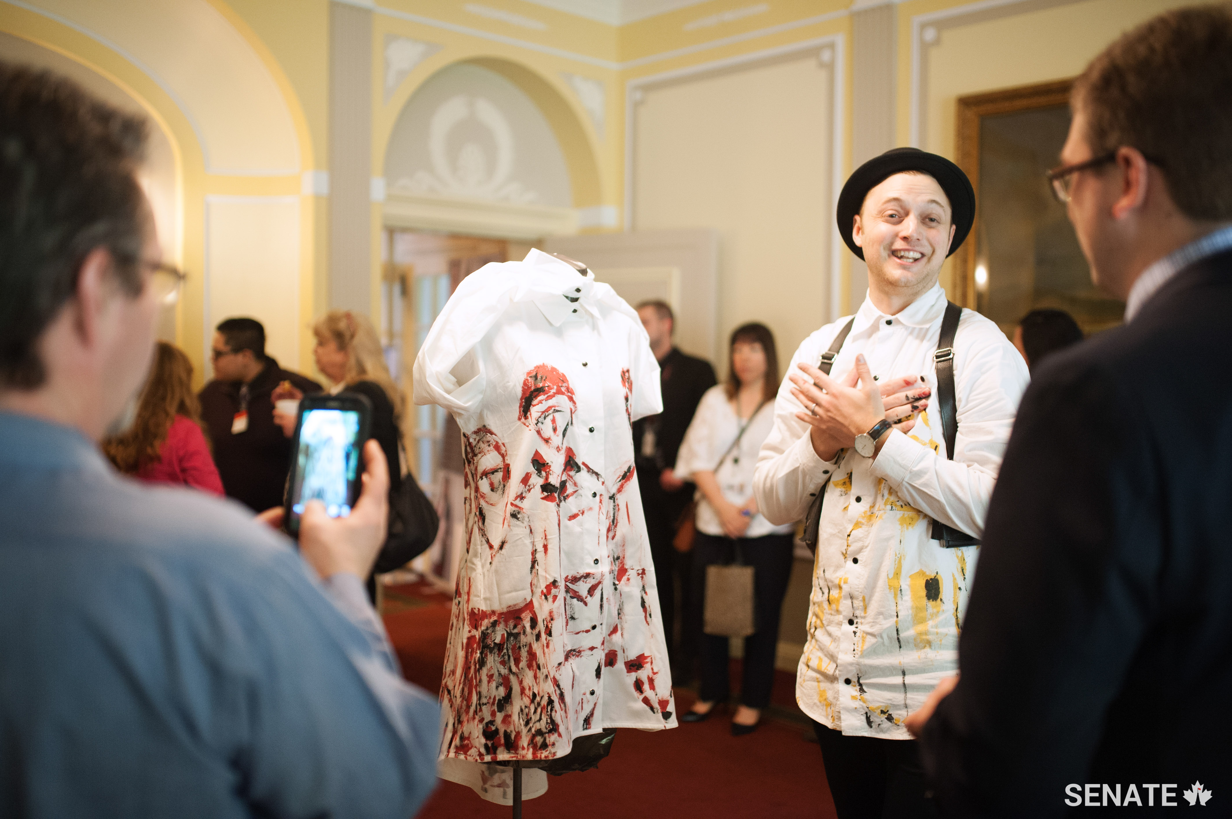 Taylor, whose work in fashion focuses on inclusivity and diversity, showed off a finished shirt.