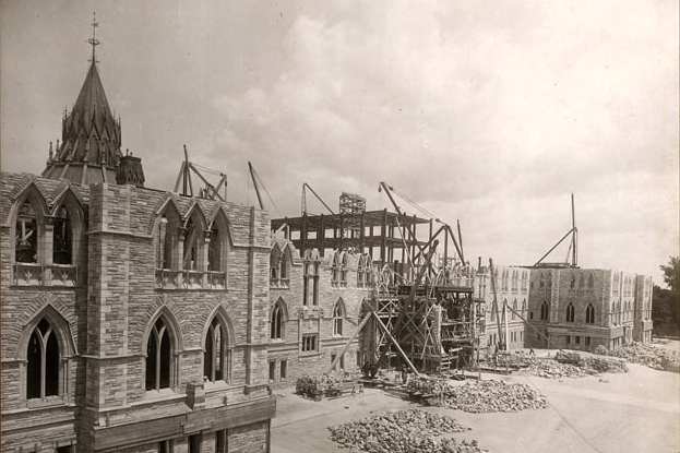 Construction was well underway when parliamentarians gathered on July 2, 1917, to dedicate the new Centre Block being built to replace the 19th-century original, destroyed by fire in 1916.
