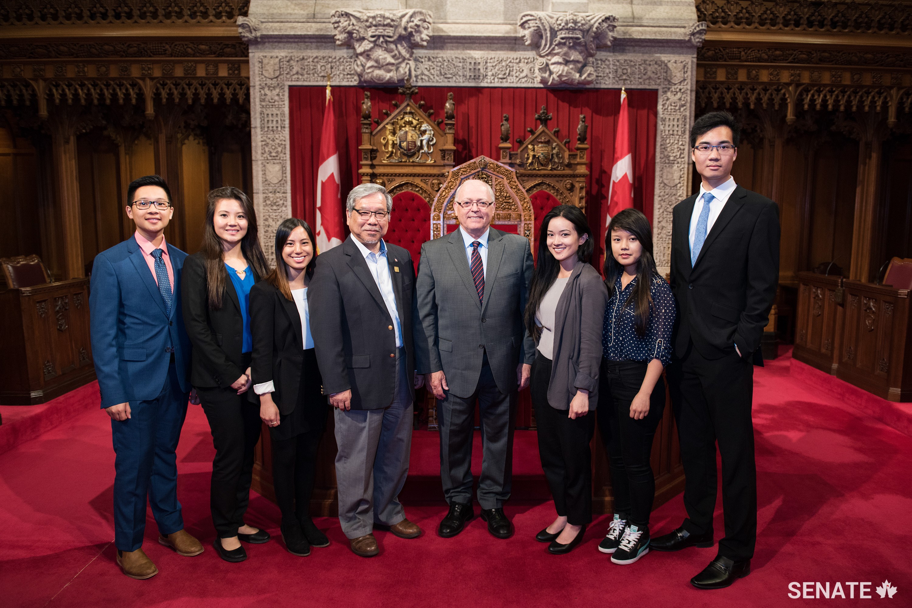 Senator Thanh Hai Ngo and Speaker of the Senate George J. Furey visit the Senate Chamber with students from the fifth edition of the internship program.