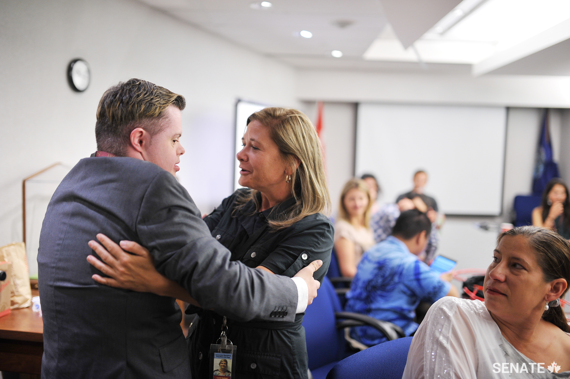 Michael Hurley-Trinque embraces special education technician Laurie Souliere.