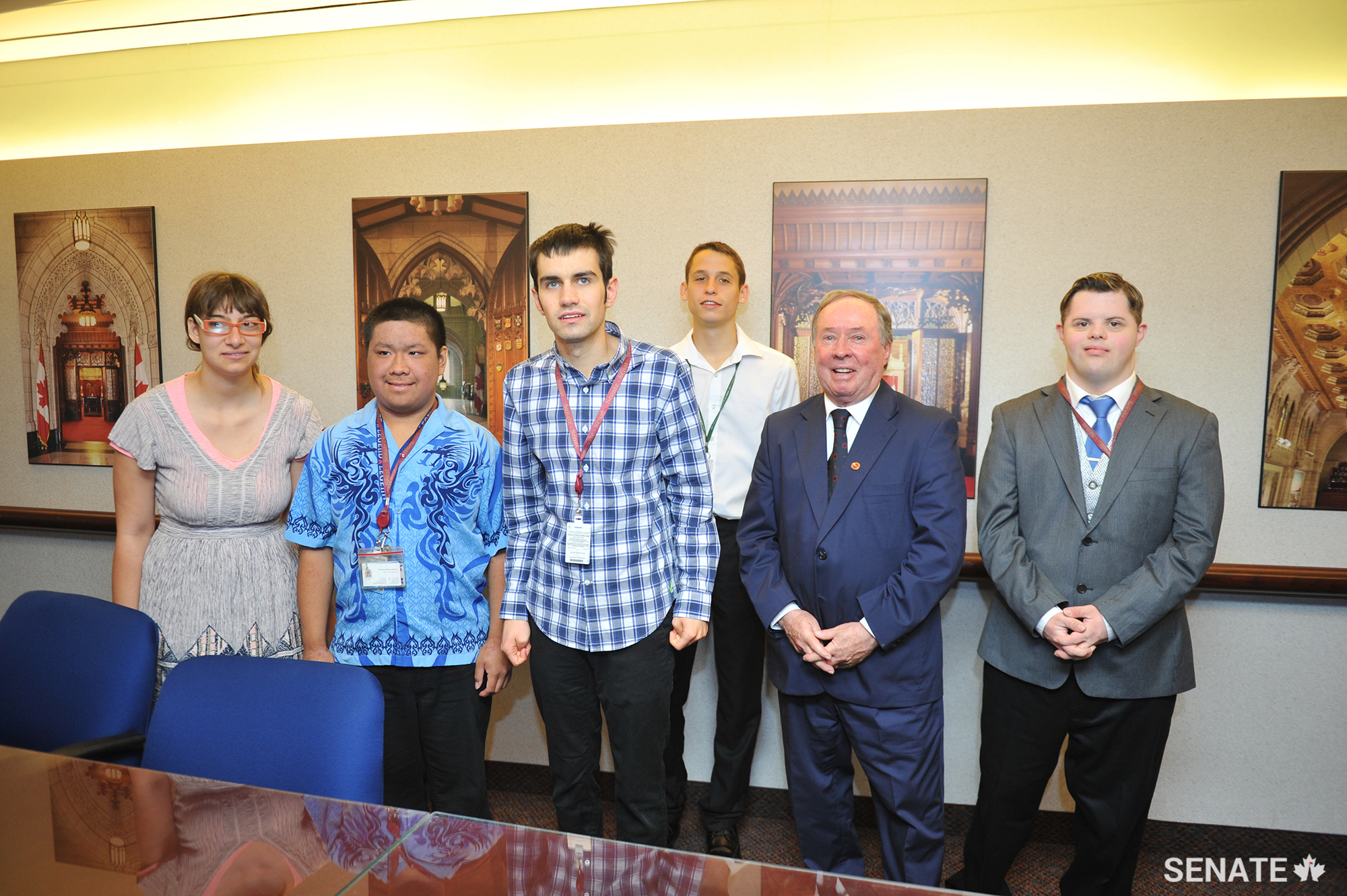 Students and Senator Jim Munson celebrate at the Friends of the Senate closing event.