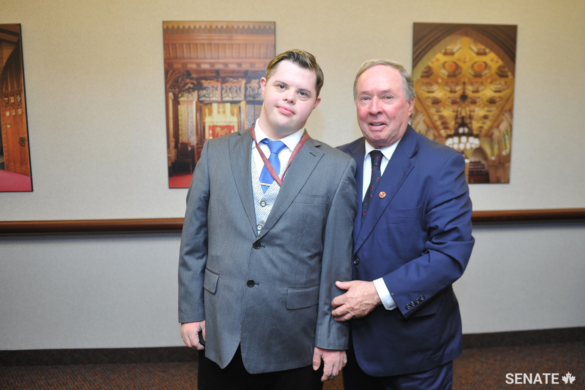 Michael Hurley-Trinque starts each work day with a big smile and hug from Senator Jim Munson.