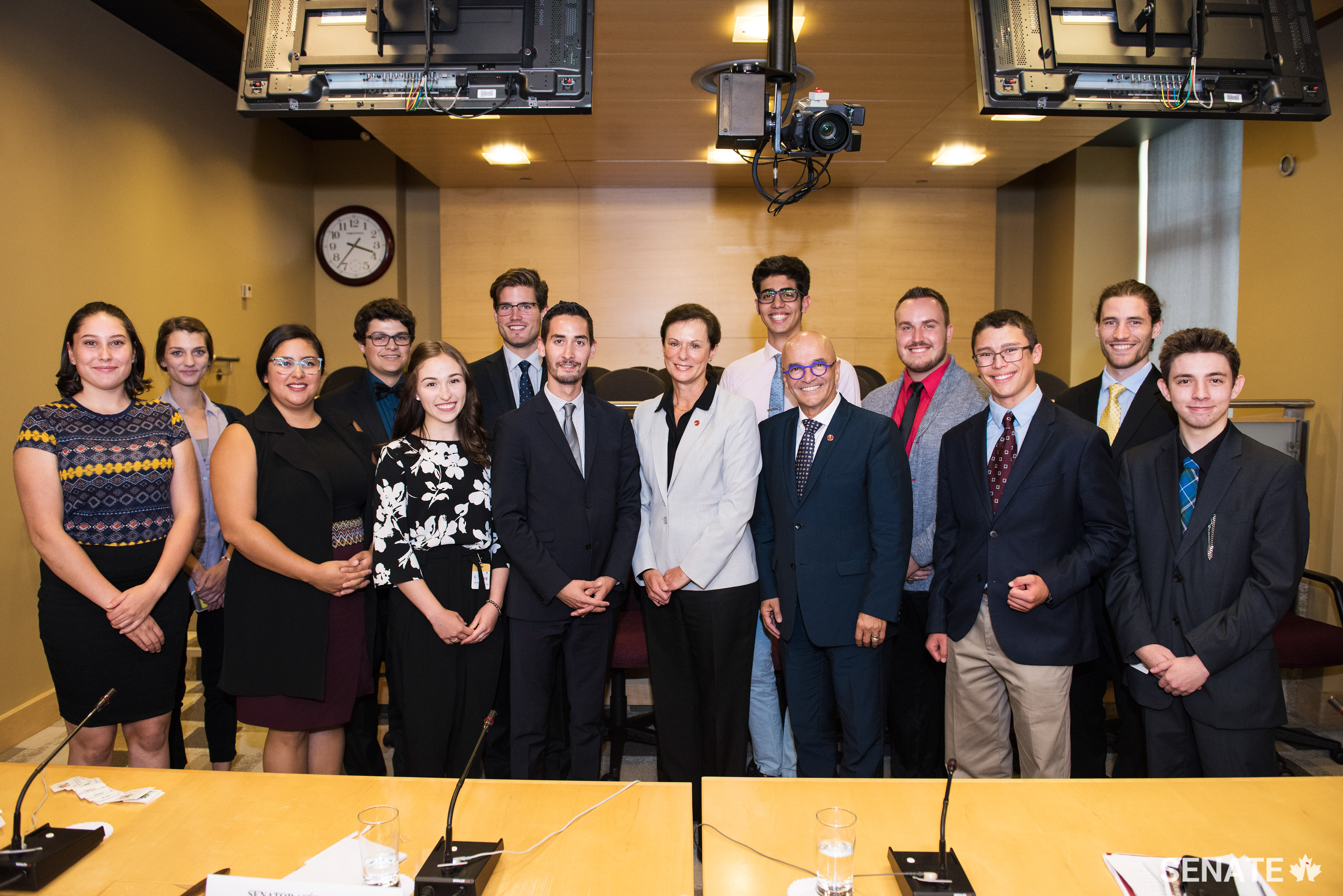 Senators René Cormier and Lucie Moncion (centre) —members of the Senate Committee on Official Languages teamed up with the Fédération de la jeunesse canadienne-française for a round-table discussion aiming to identify how to update the <em>Official Languages Act</em> to meet the realities of the 21st century.