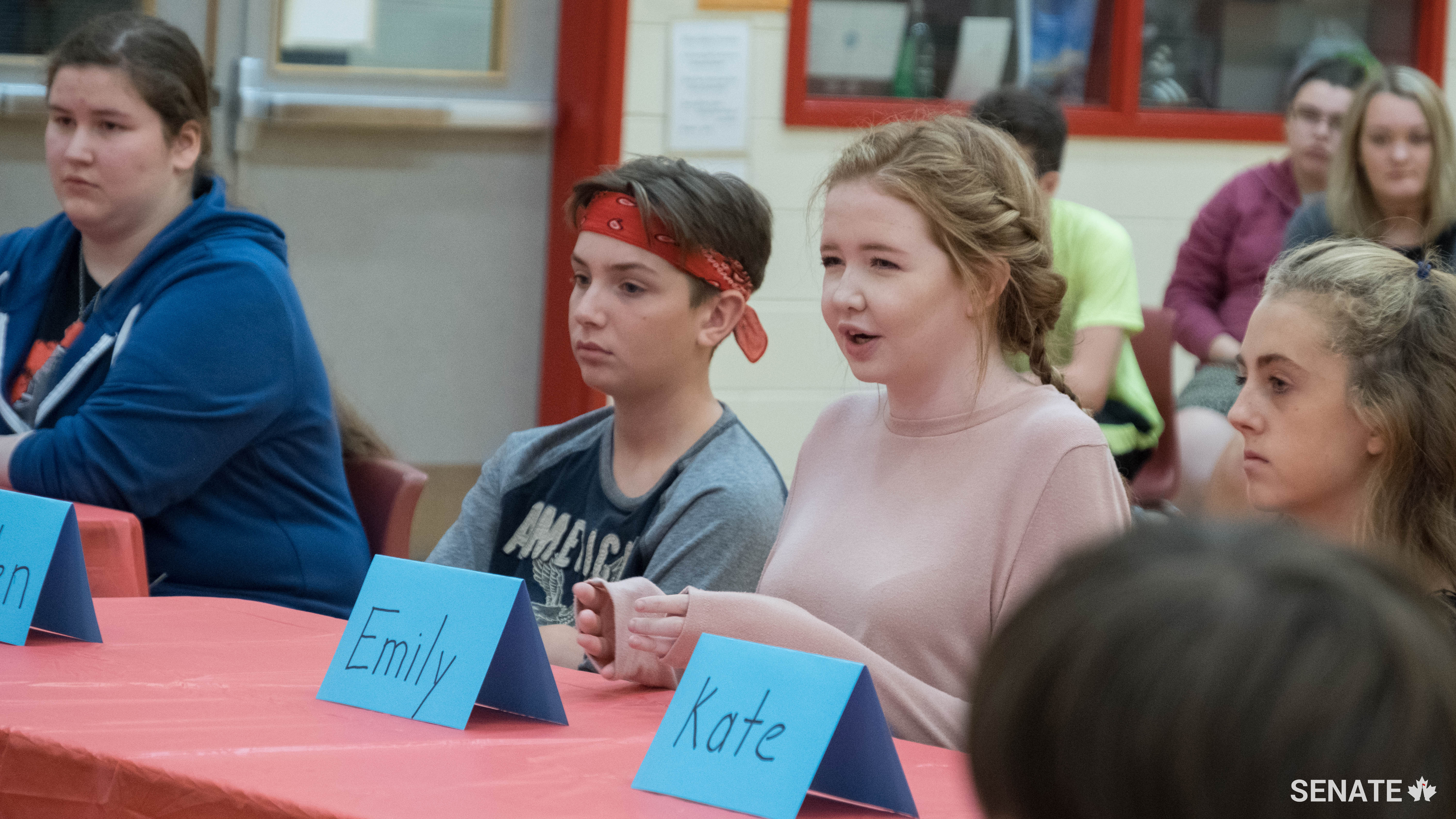 Emily Woodside, centre, and other students at Athena Consolidated School in Summerside, PEI, speak to members of the Senate Committee on Officials Languages during a round-table discussion Thursday, September 21, 2017. Committee members were in PEI for a fact-finding mission for their study on how to modernize the Official Languages Act.