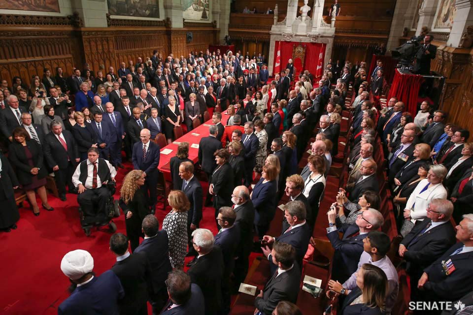 Guests rise as Governor General Designate Julie Payette enters the Senate Chamber.