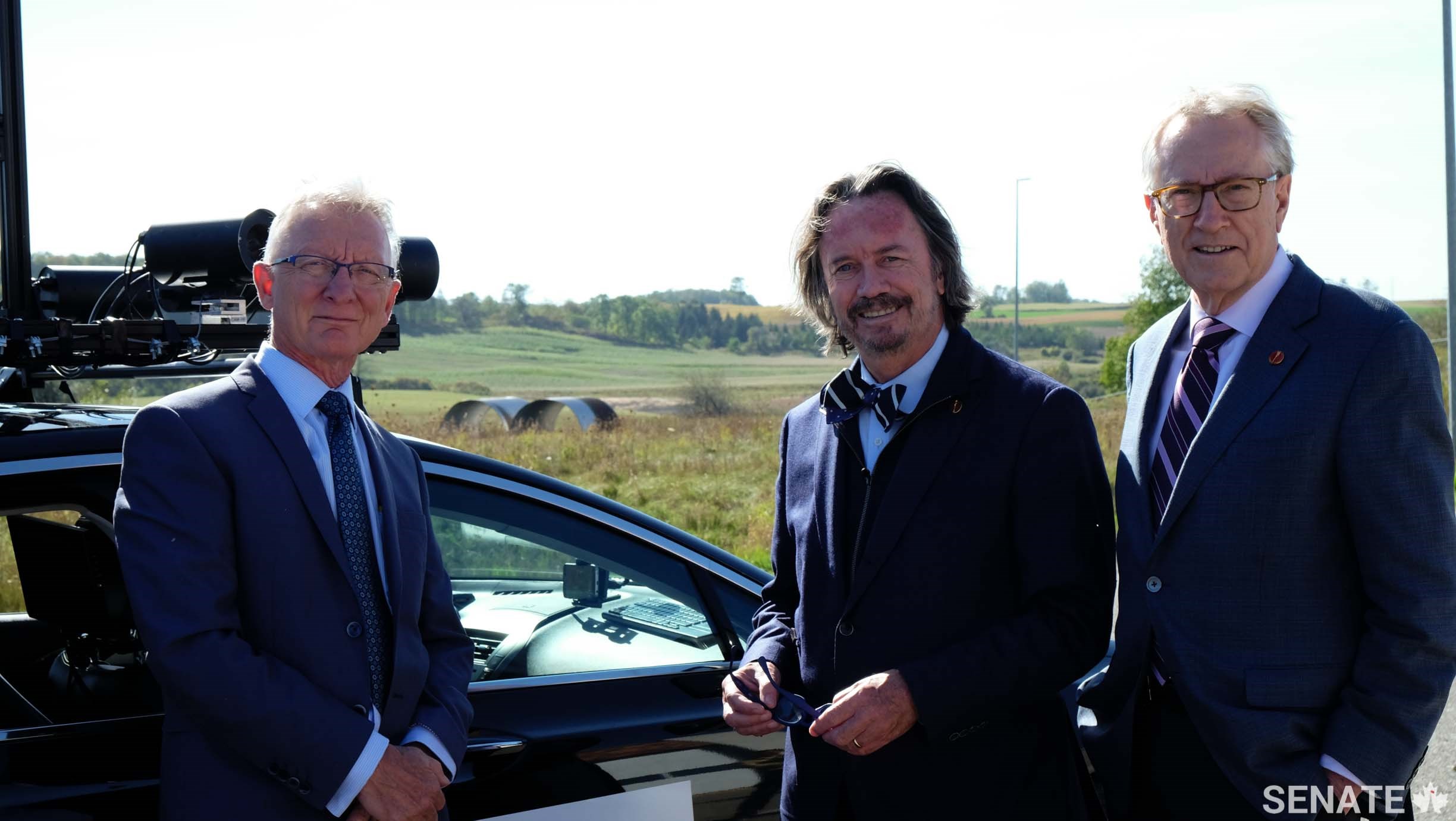 Senators Pierre-Hugues Boisvenu, Dennis Dawson and Art Eggleton test an automated vehicle at the University of Waterloo’s Centre for Automotive Research’s test track on October 3, 2017.