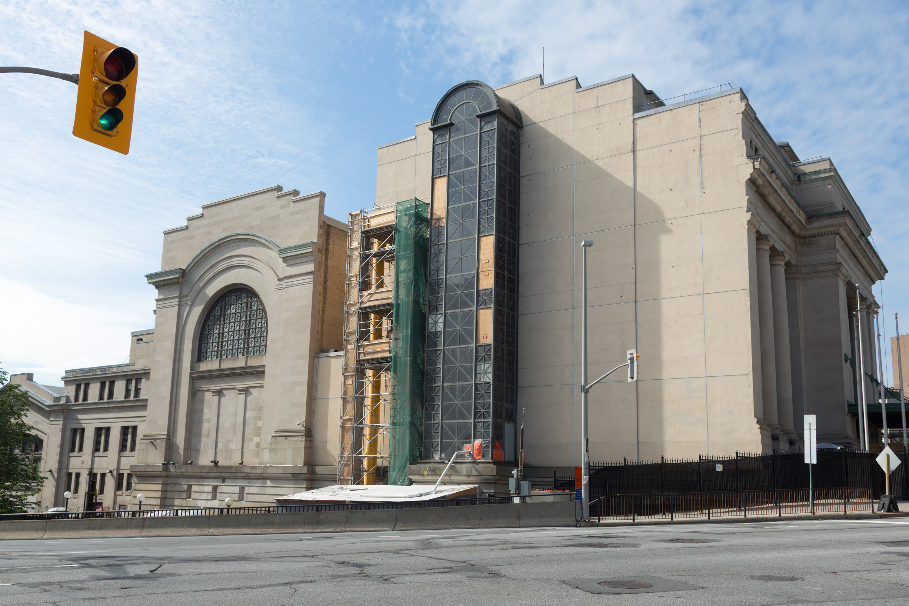 In 2015, workers began to demolish the bare masonry east facade and a stairwell addition built in 1984.