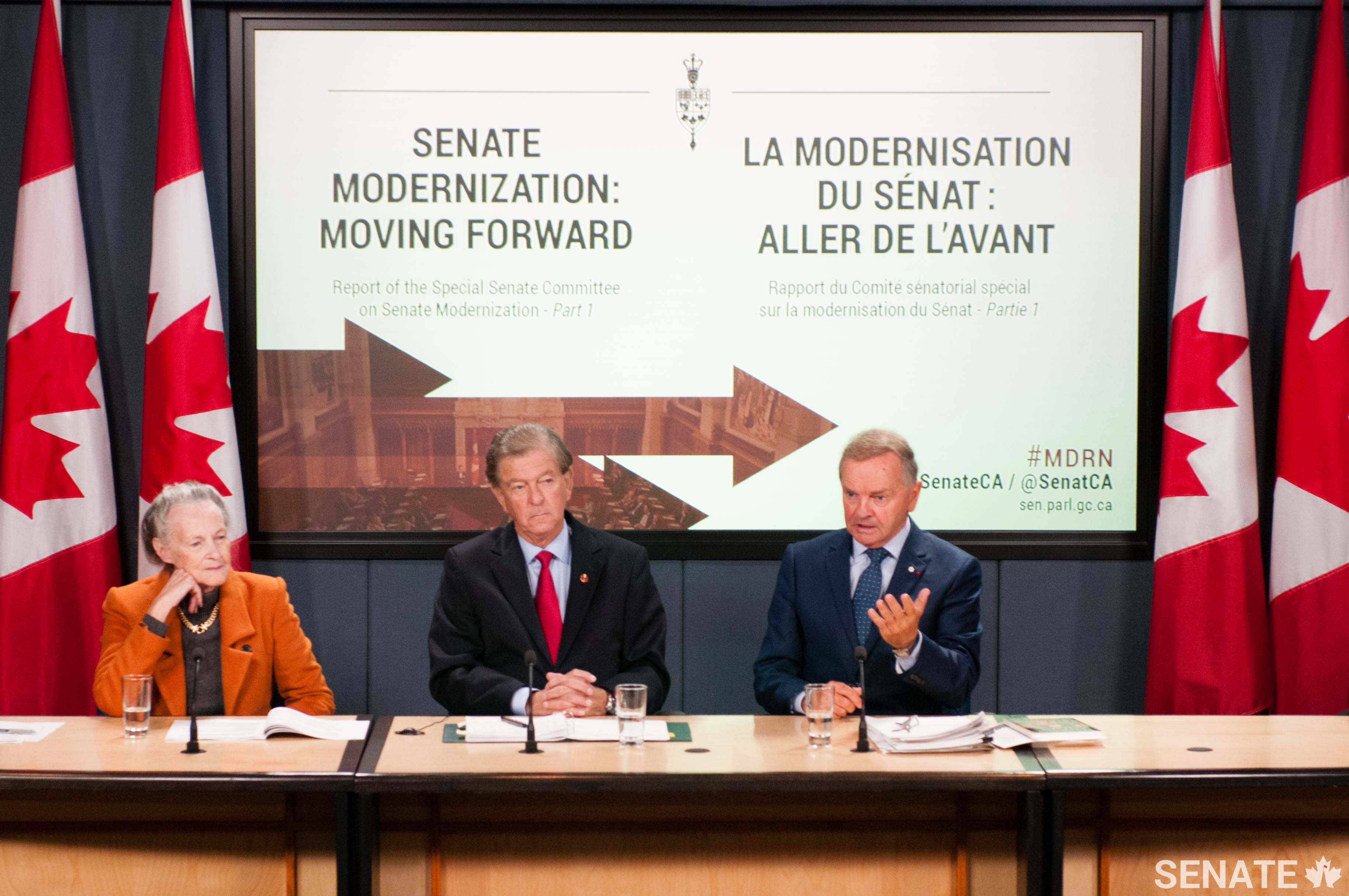 Senator Joyal is joined by Senators Thomas J. McInnis and Elaine McCoy at the launch of the Senate Committee on Senate Modernization’s <a href='https://sencanada.ca/en/sencaplus/news/modernization-a-senate-more-open-more-inclusive-more-effective/'>first report</a> in October 2016.