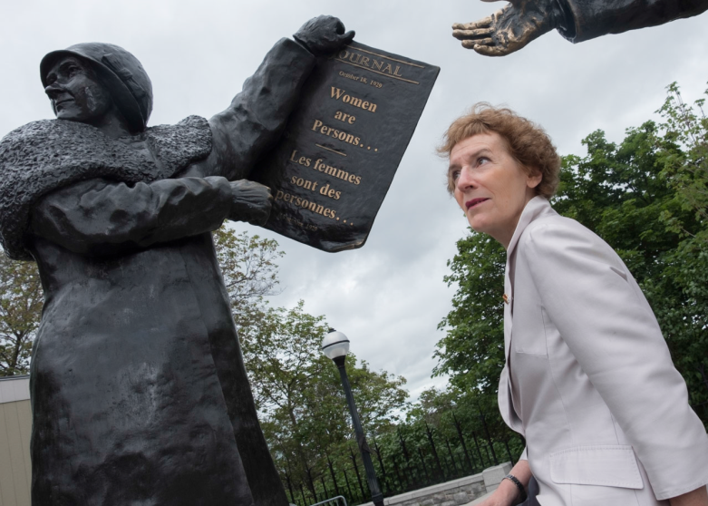 Senator Dupuis draws inspiration from the <a href='https://sencanada.ca/en/sencaplus/how-why/why-the-persons-case-matters/'>Persons Case</a> statue on Parliament Hill. Senator Dupuis served as a commissioner with the Canadian Human Rights Commission from 1989 to 1995, where she took a special interest in such issues as discrimination against women, sexual harassment, pay equity and employment equity.