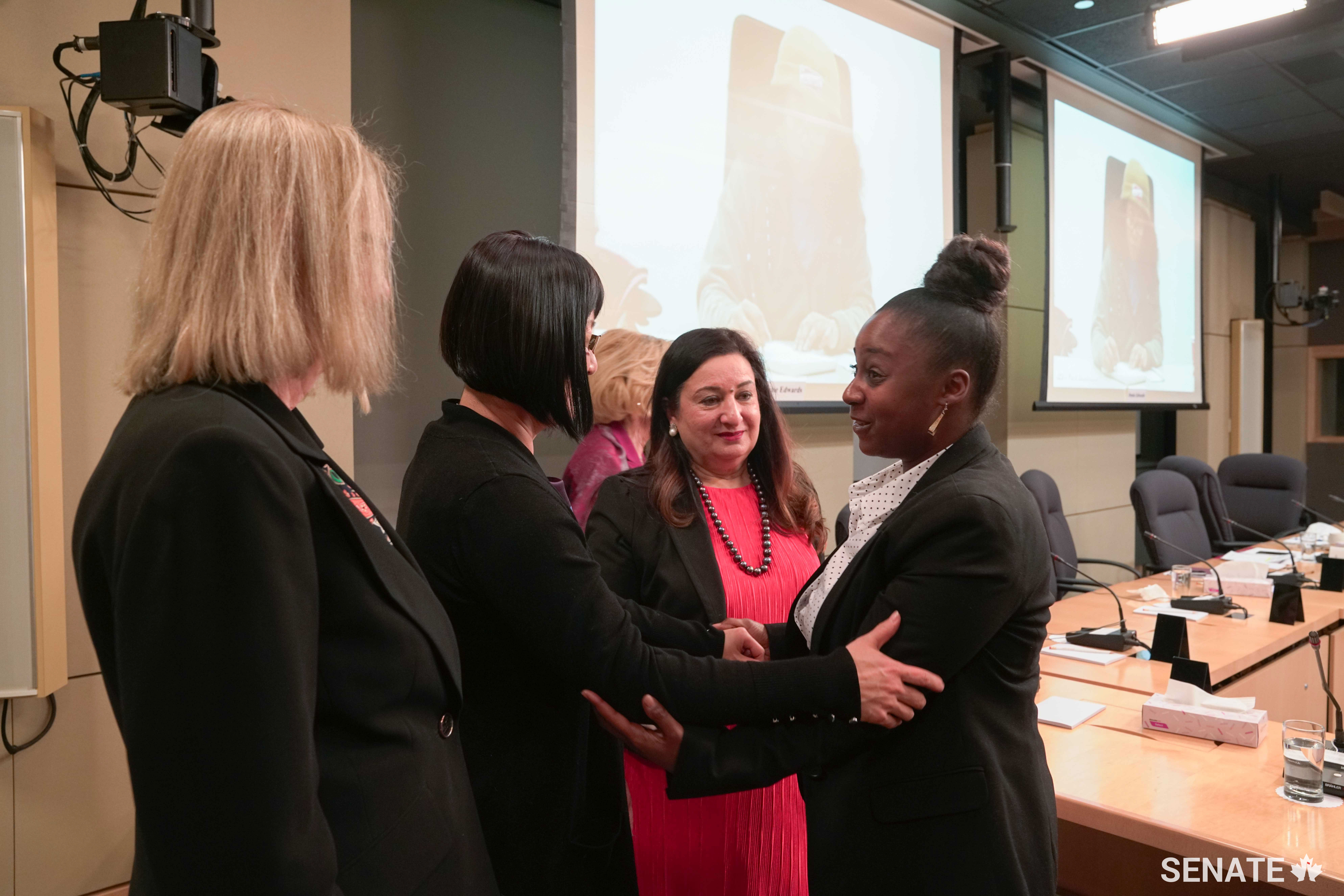 From left, Senator Jane Cordy, deputy chair of the Senate Committee on Human Rights, Senator Yonah Martin, and deputy chair Senator Salma Ataullahjan thank Natalie Charles, a former federal prisoner, for her testimony at a committee meeting. During one of its February meetings, the committee focused on conditions faced by Black prisoners.