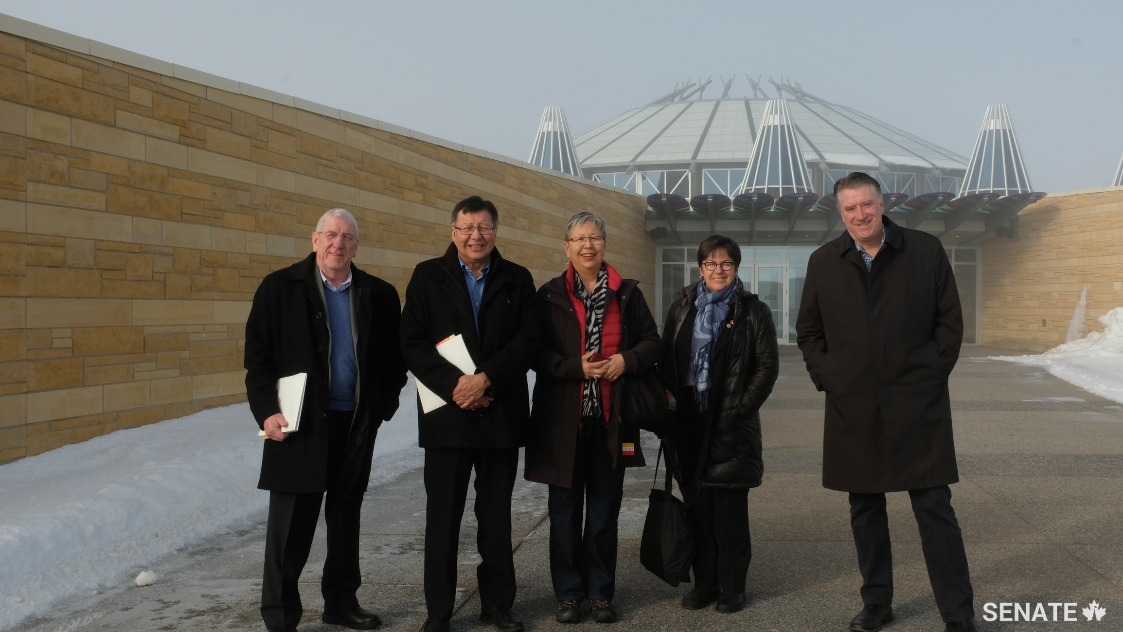 From left, senators Norman Doyle, Dan Christmas, Lilian Eva Dyck, Kim Pate and Scott Tannas take in the Blackfoot Crossing Historical Site in Alberta, where Treaty 7 was signed in 1877. Members of the Senate Committee on Aboriginal Peoples undertook a fact-finding mission to Western Canada as part of their study on a new relationship between Canada and Indigenous peoples.