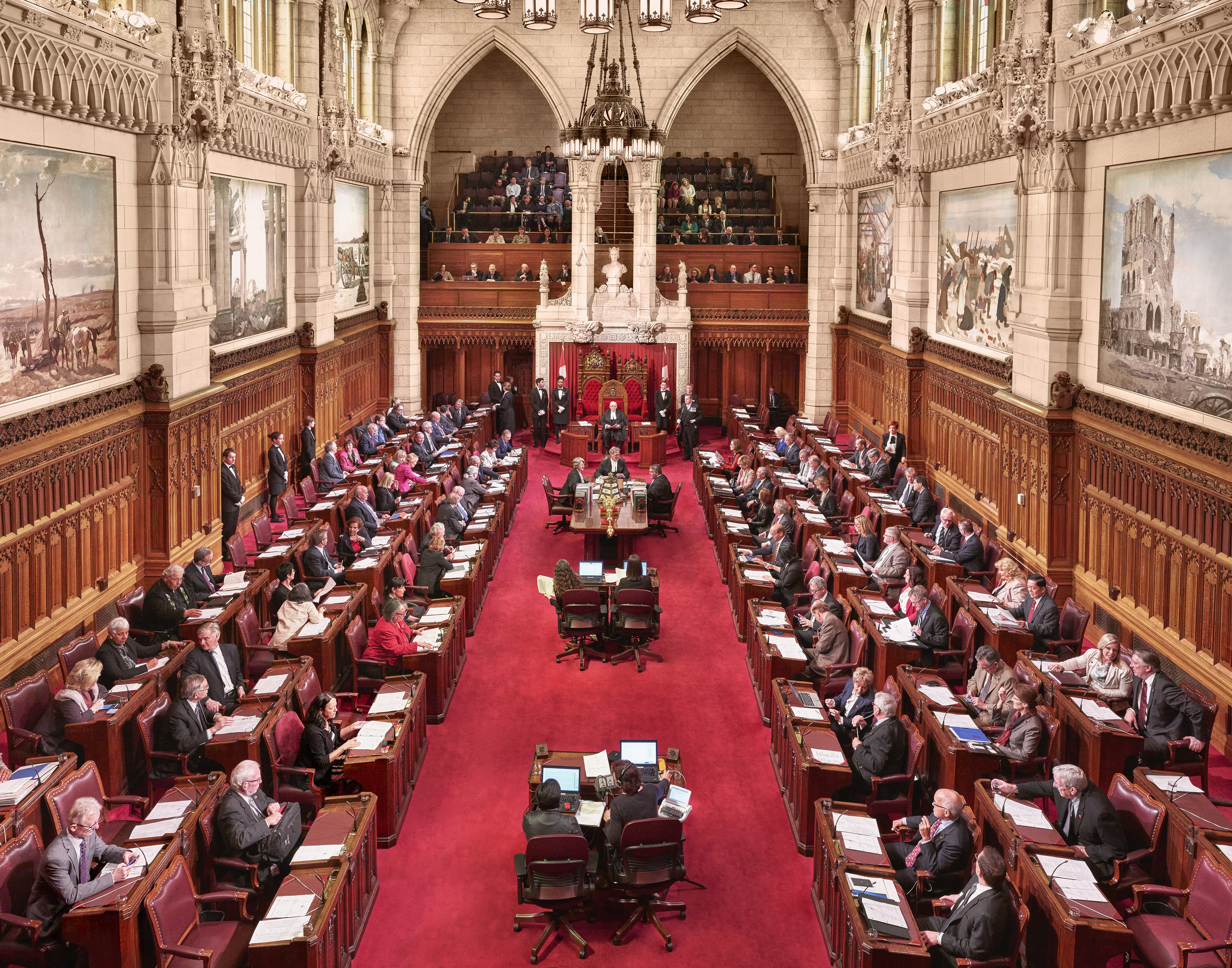 In Canada’s Parliament, senators are legislators with the authority to introduce bills. Any bill that originates in the Senate Chamber, seen here, must also be passed in the House of Commons and vice versa.