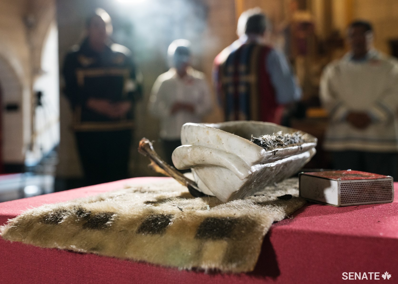 Senators and Indigenous youth took part in a smudging ceremony in the Senate foyer as part of the opening ceremony of Youth Indigenize the Senate.