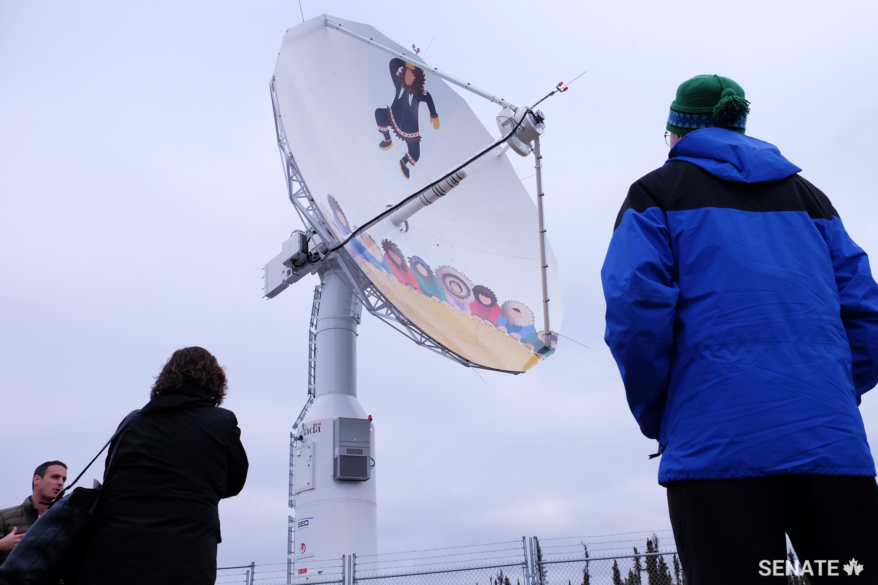 Senators Dennis Patterson and Mary Coyle visit the Inuvik Satellite Station Facility. The European Space Agency built a series of satellites in 2010 to gather real-time data for mapping and weather services in the north.