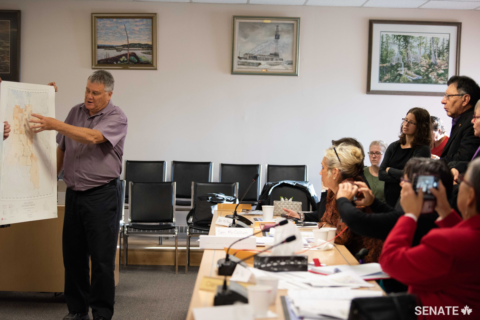 Senators listen as Inuvik’s Senior Administrative Officer explains how this complex Indigenous and non-Indigenous region is organized.