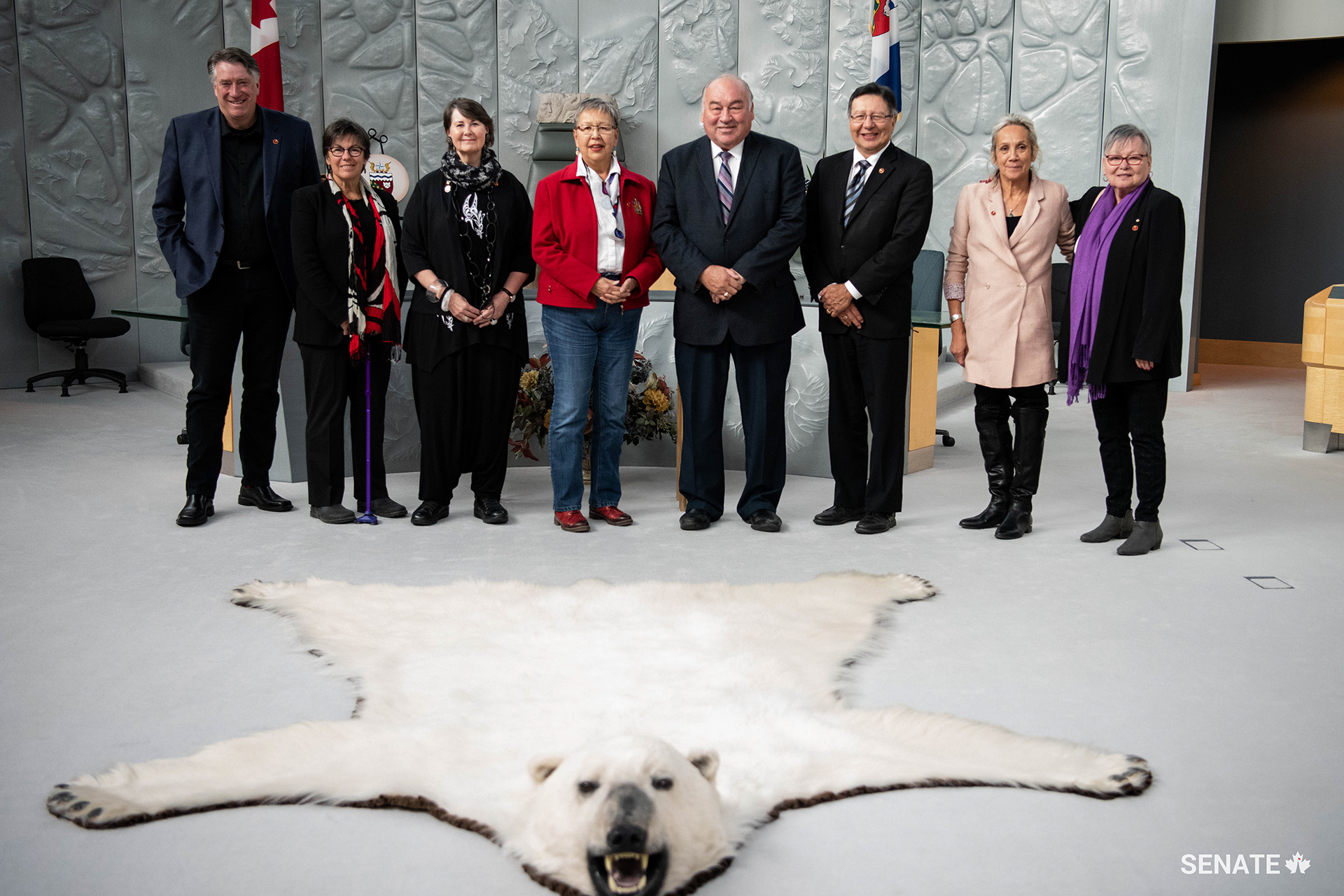 Members of the Senate Committee on Aboriginal Peoples join Northwest Territories Premier Bob McLeod in the chamber of the Legislative Assembly in Yellowknife. The premier expressed his appreciation of the committee's work on their fact-finding mission.