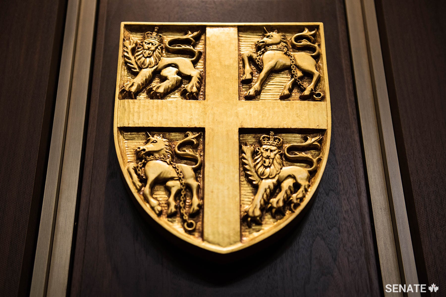 English lions, Scottish unicorns and the Cross of St. George form the elements of the shield of Newfoundland and Labrador.
