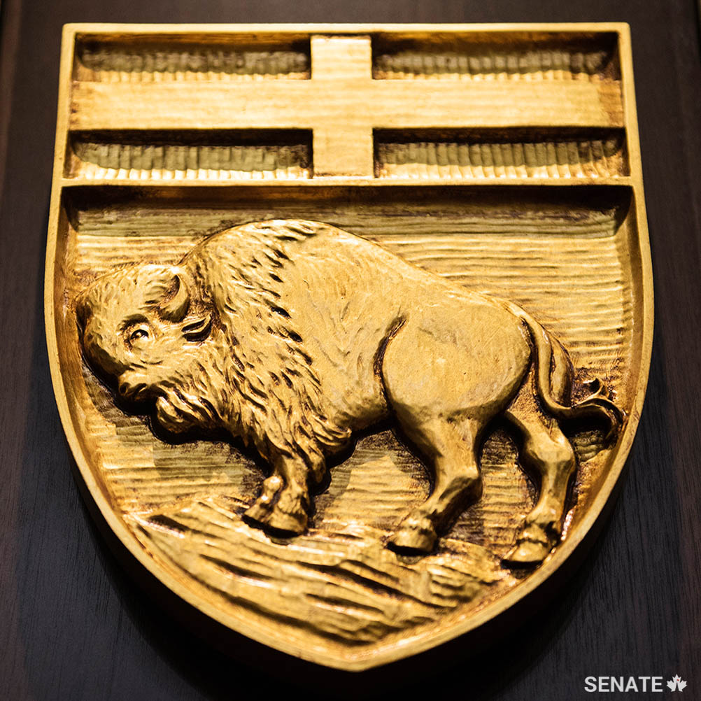 Manitoba’s shield features a bison and the Cross of St. George, the flag of England.