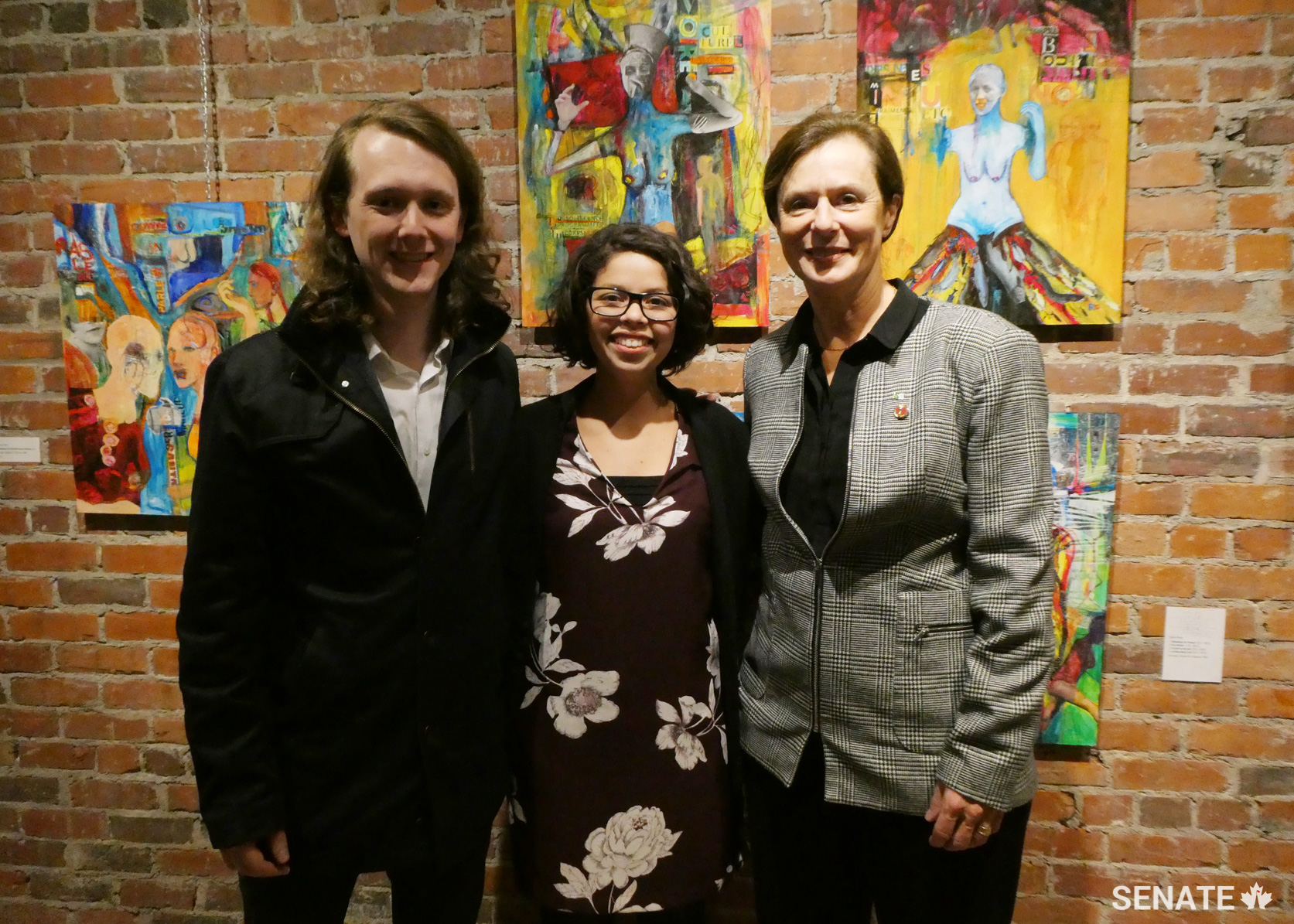 From left to right, Éric Dow, Communications and Public Relations Officer, Société de l'Acadie Nouveau-Brunswick, Nelly Dennene, Executive Director of the Regroupement féministe du Nouveau-Brunswick, and Senator Lucie Moncion, member of the Committee on Official Languages, at the Aberdeen Cultural Centre in Moncton on October 25, 2018.
