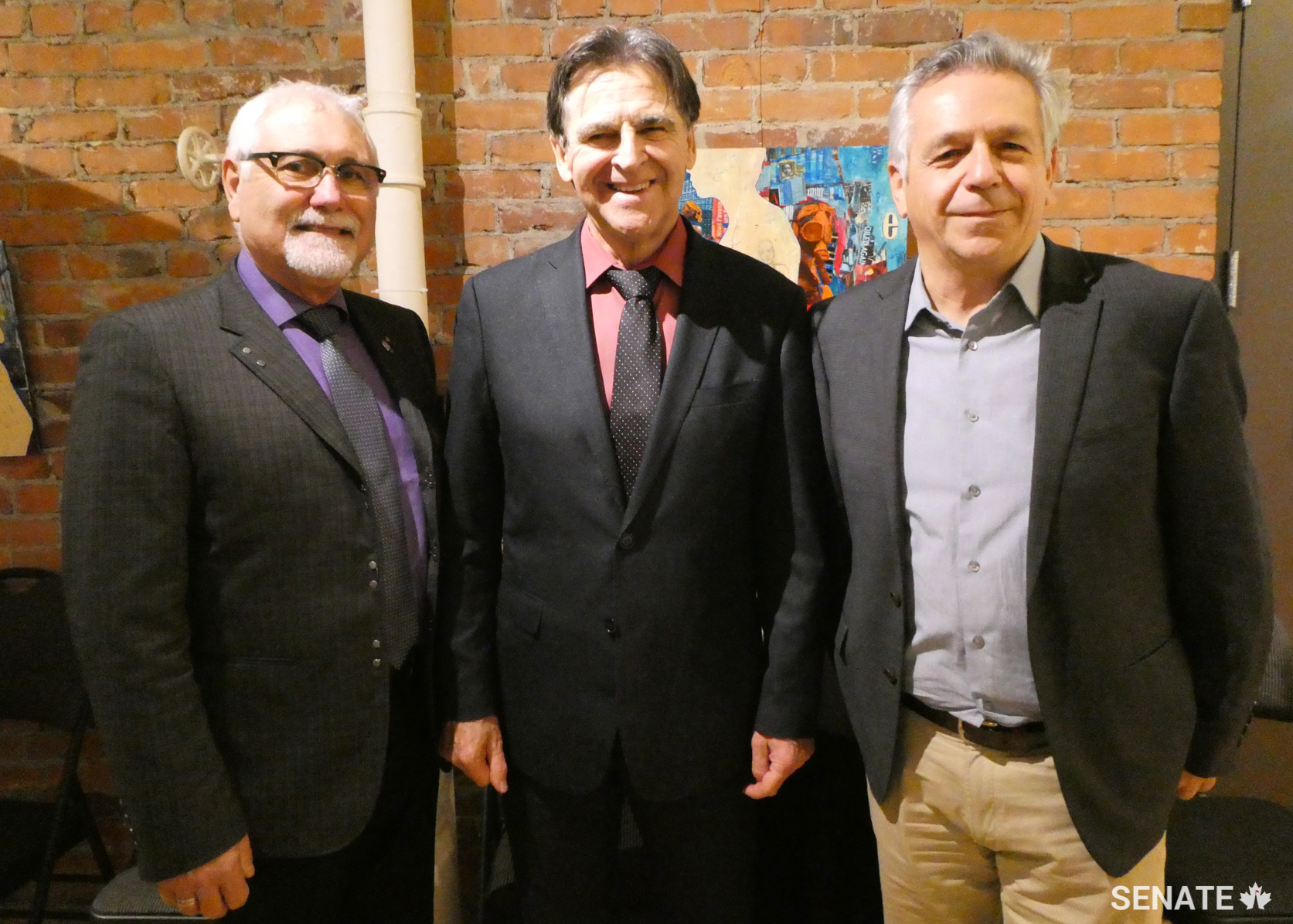 From left to right, Luc Doucet, President of Richelieu International and Executive Director of the New Brunswick Seniors' Association, Senator Paul E. McIntyre, Member of the Committee on Official Languages, and René Légère, Executive Director of the Aberdeen Cultural Centre, at the Aberdeen Cultural Centre in Moncton on October 25, 2018.