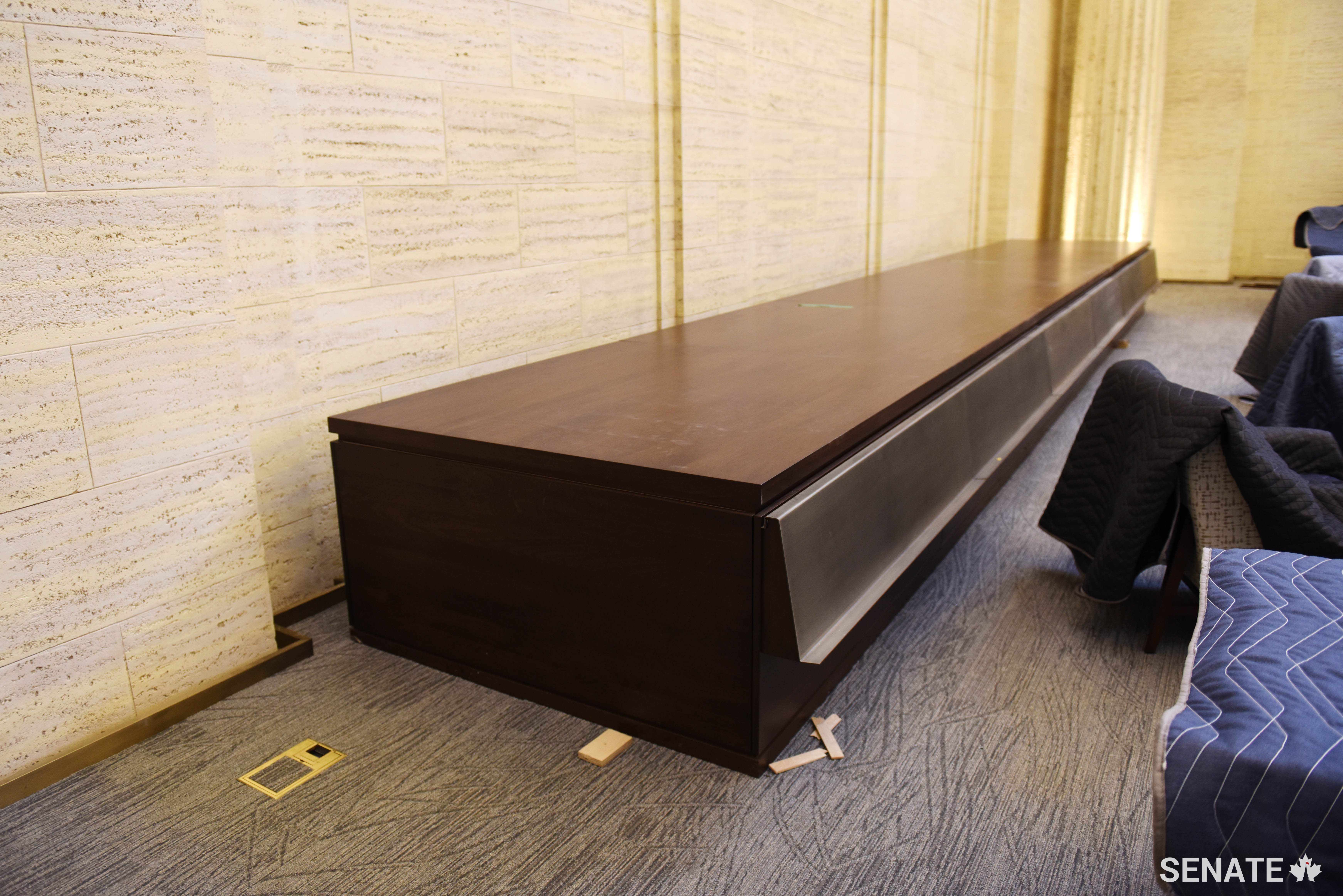 This wooden cabinet may look like just another piece of furniture but it’s actually integral to the energy efficiency of the Senate of Canada Building. Hidden inside are mechanical elements of the state-of-the-art heating and cooling system. Treated air rises through the cabinet then sweeps up the walls of the building into the vaulted ceilings. This provides optimal air circulation while maintaining the heritage esthetic of the building.