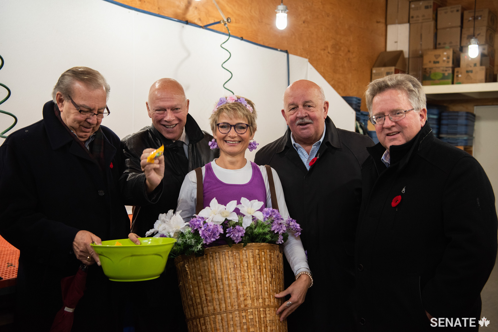 On October 31, Halloween, the committee visits the Wise Earth Farm in Kelowna, BC, where they are welcomed with a basket of living flowers. The day began on a sweet note.