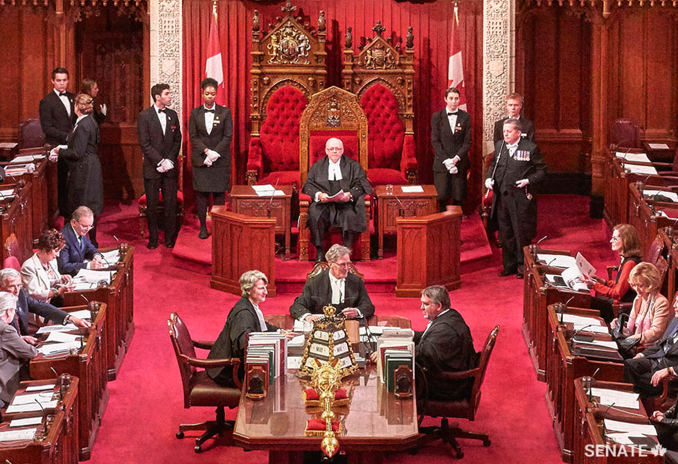 The Senate in session: In this 2016 photo, Senator George J. Furey, current Speaker of the Senate, occupies the Speaker’s chair at the head of the Chamber. The Clerk of the Senate and other table officers sit directly in front of him.