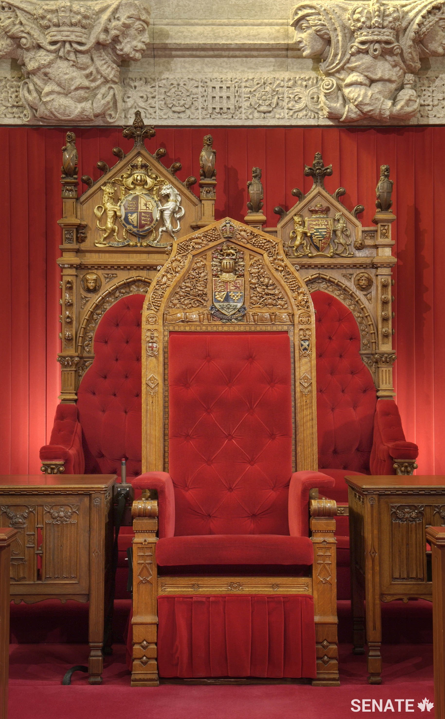 The monarch’s and consort’s thrones, carved in 1878, are among the very few Senate fixtures salvaged from the 1916 fire that destroyed the original Centre Block. The Senate Speaker’s chair in front was carved in 1923. All three went into storage and less ornate versions created specifically for the new Senate Chamber are being used in the interim.
