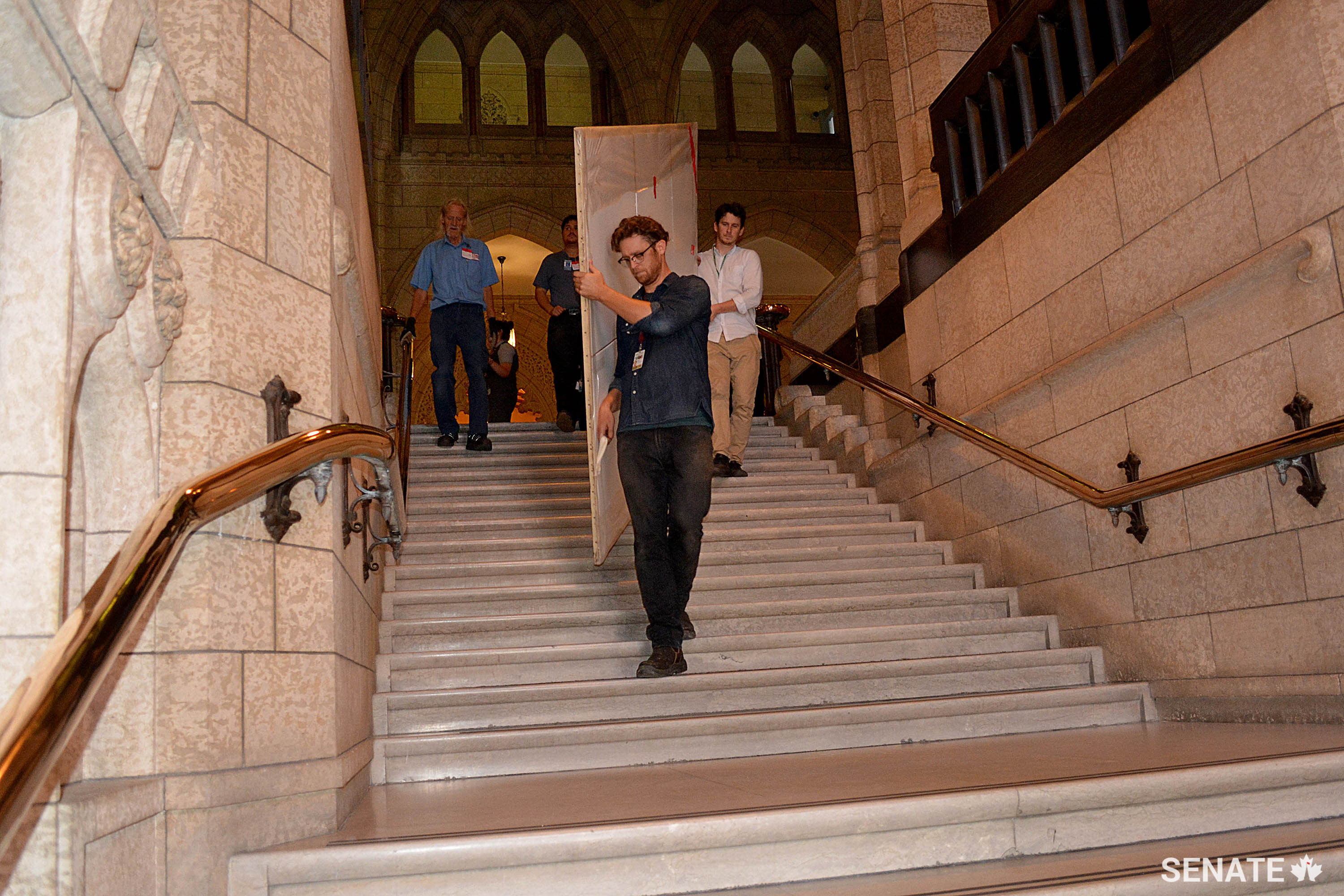 Paintings were wrapped in museum-grade protective plastic during transit.