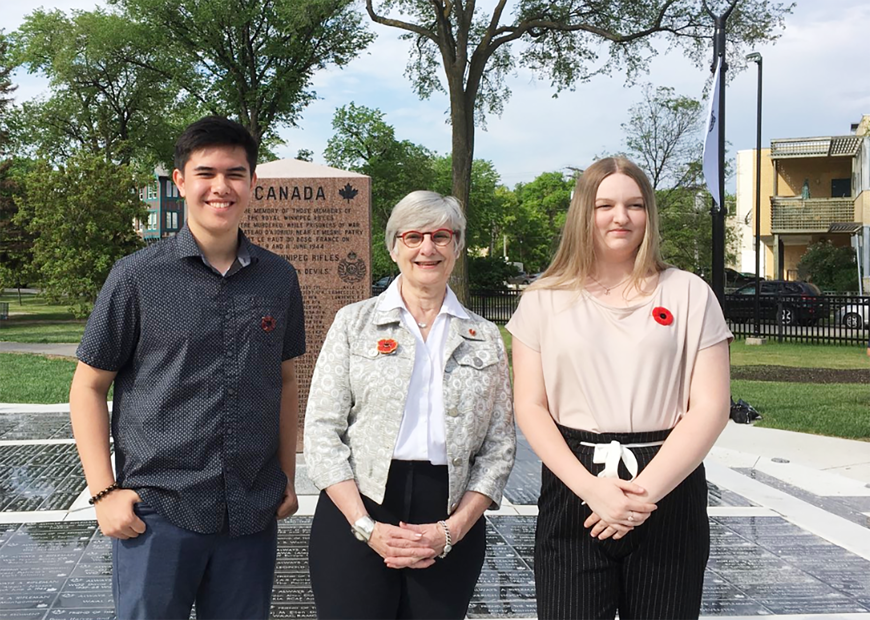 Saturday, June 8, 2019 — Senator Patricia Bovey congratulates Winnipeg students Jordan Talledo and Alyssa Mason who were selected to join 24 students to tour Canadian battlefields of the first and second world wars as part of the Juno75 Student Pilgrimage in July. This once-in-a-lifetime opportunity for high school students from across Canada is sponsored by the Juno Beach Centre and will enable participants to travel to Northern France and Belgium to gain first-hand knowledge of Canada’s participation in the first and second world wars.