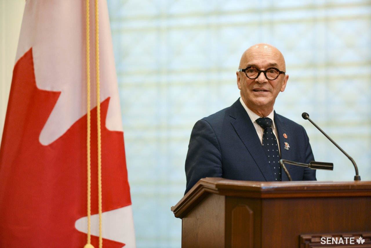 Senator René Cormier speaks at the book launch event. Senator Cormier was a facilitator at the Canada 150 Senate Symposium held in May 2017 that laid the foundation for the book project.