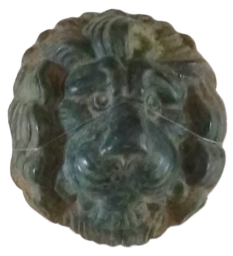 An artifact recently unearthed on Parliament Hill that could be an ear boss – in the shape of a lion’s head – from a military cap.