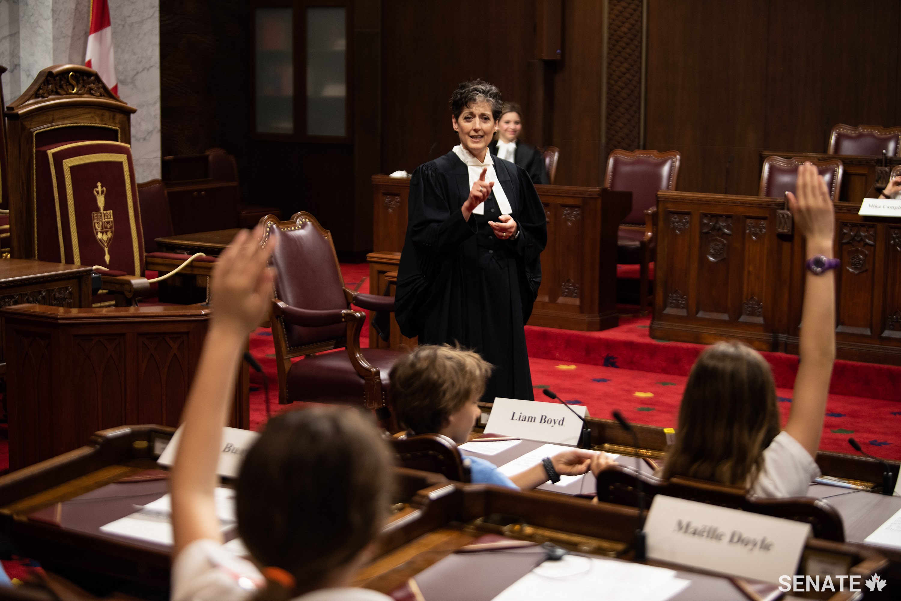 Senator Forest-Niesing chairs a mock Senate session with Grade 6 students from the Ottawa region on May 17, 2019.