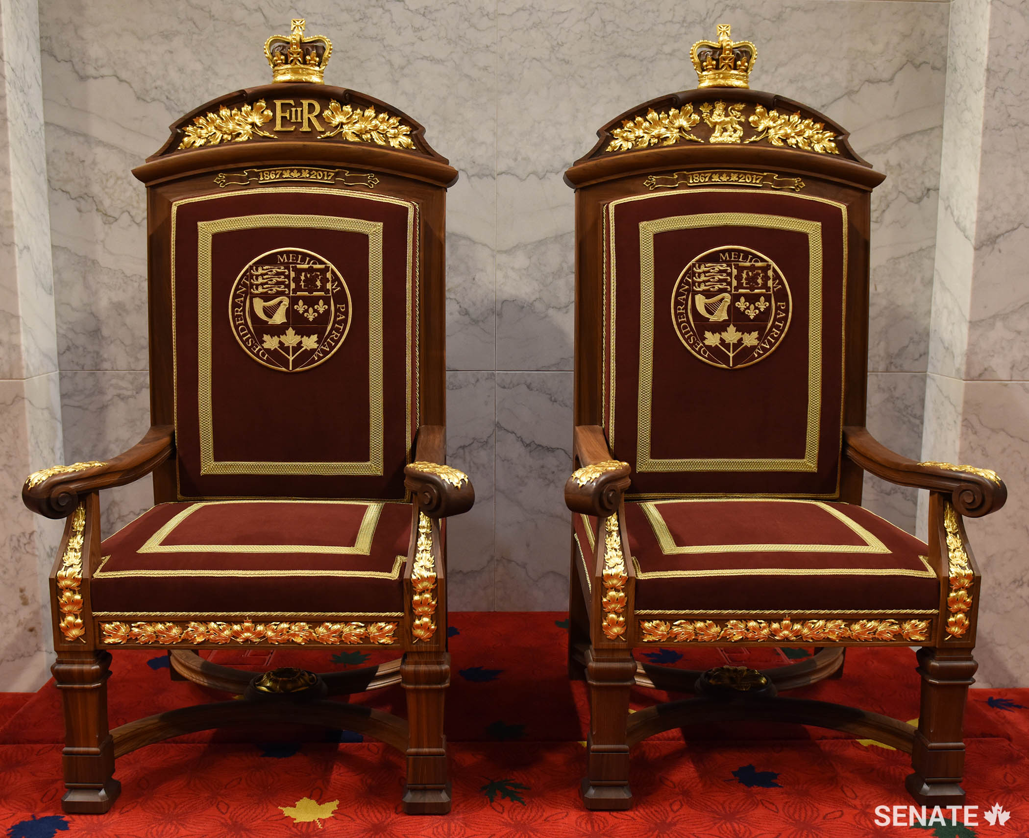 The thrones were hand-crafted in Montreal by skilled furniture makers, upholsterers, carvers and finishers.