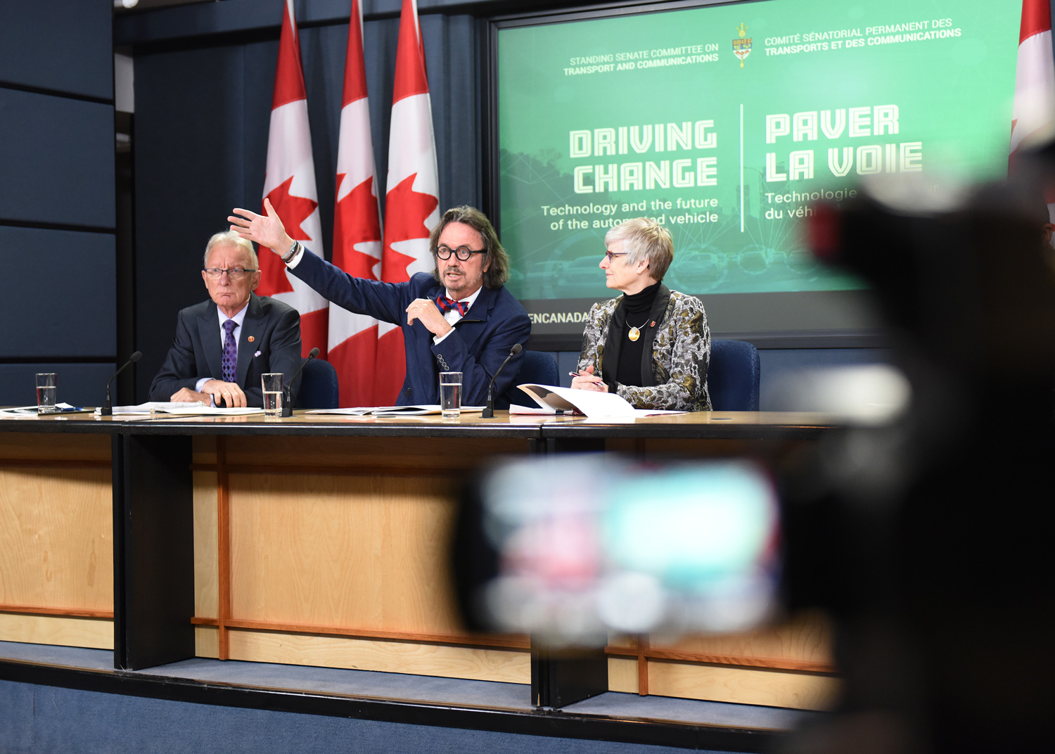 Senators Pierre-Hugues Boisvenu, Dennis Dawson and Patricia Bovey hold a press conference in January 2018 on a Senate Committee on Transport and Communications report entitled Driving Change: Technology and the future of the automated vehicle.