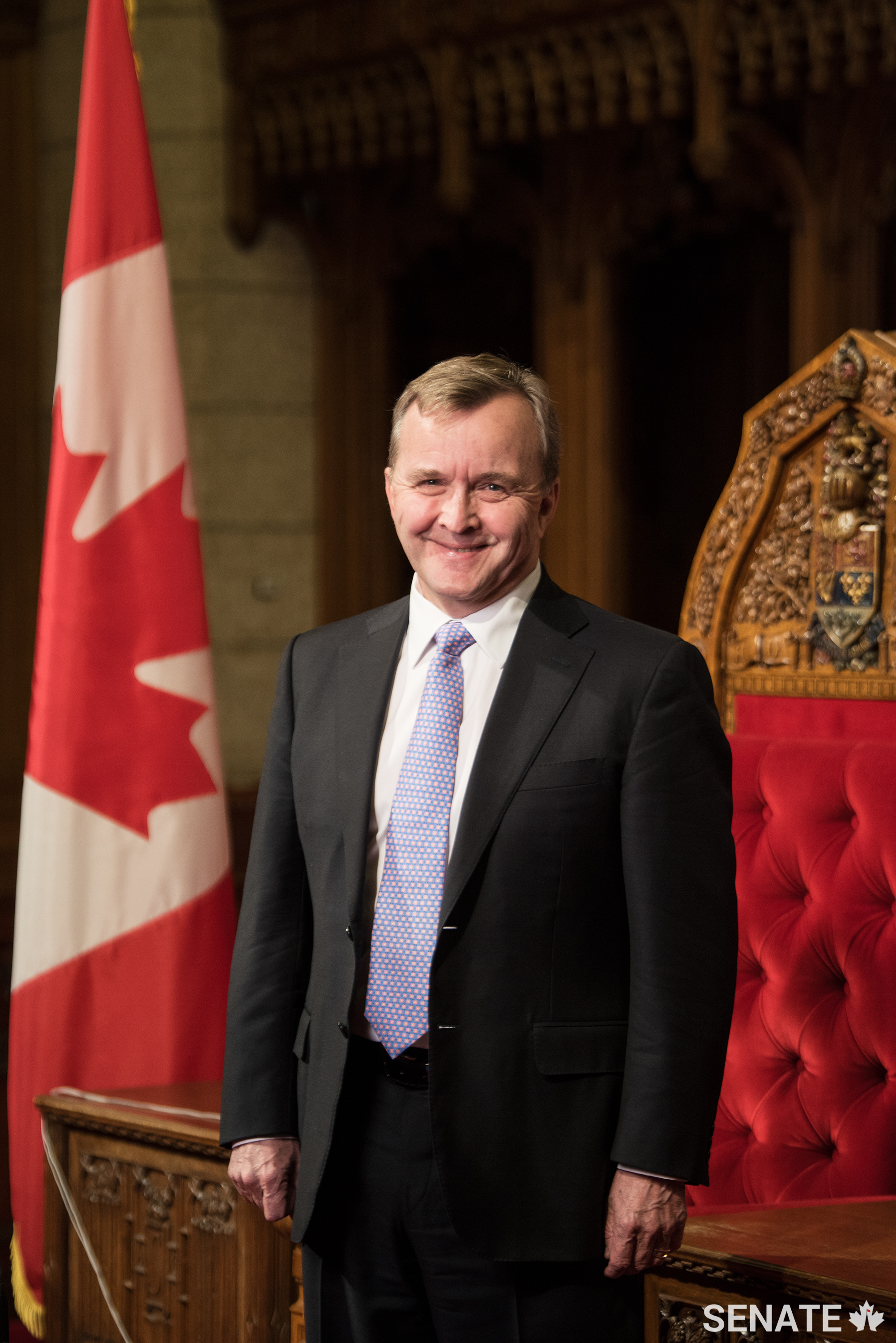 Senator Grant Mitchell stands in the Senate Chamber in Centre Block.