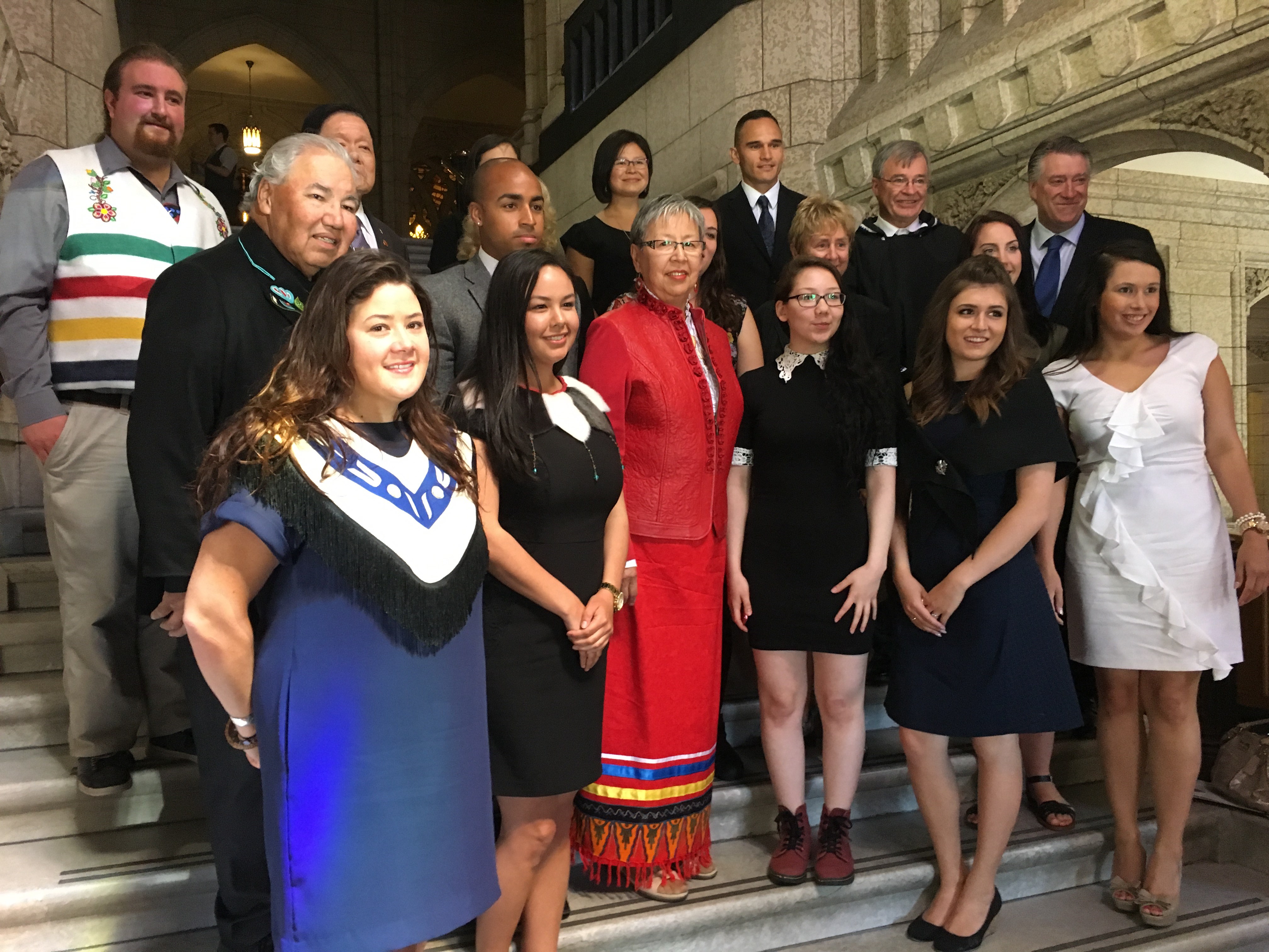 Senator Dyck and other members of the Senate Committee on Aboriginal Peoples meet with Youth Indigenize the Senate participants in Centre Block during the inaugural event on June 21, 2016. Kluane Adamek, of the Kluane First Nation in Yukon Territory, is on the far left.